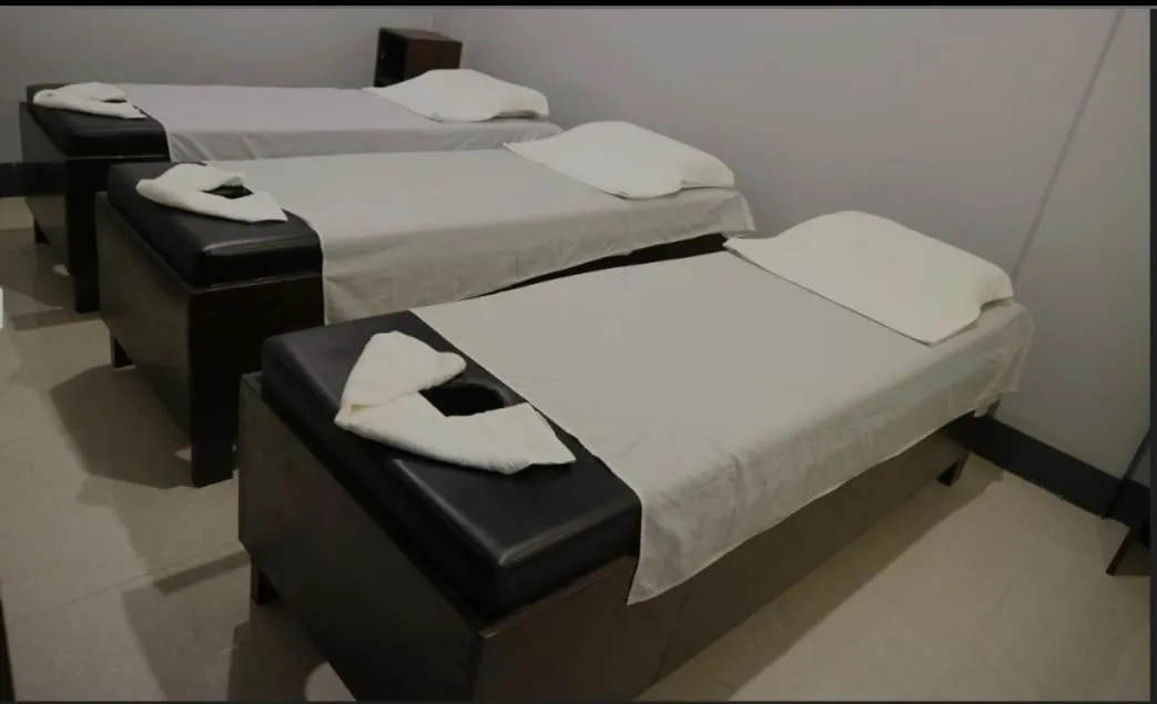 Bed in My Happy Place West Avenue Suites