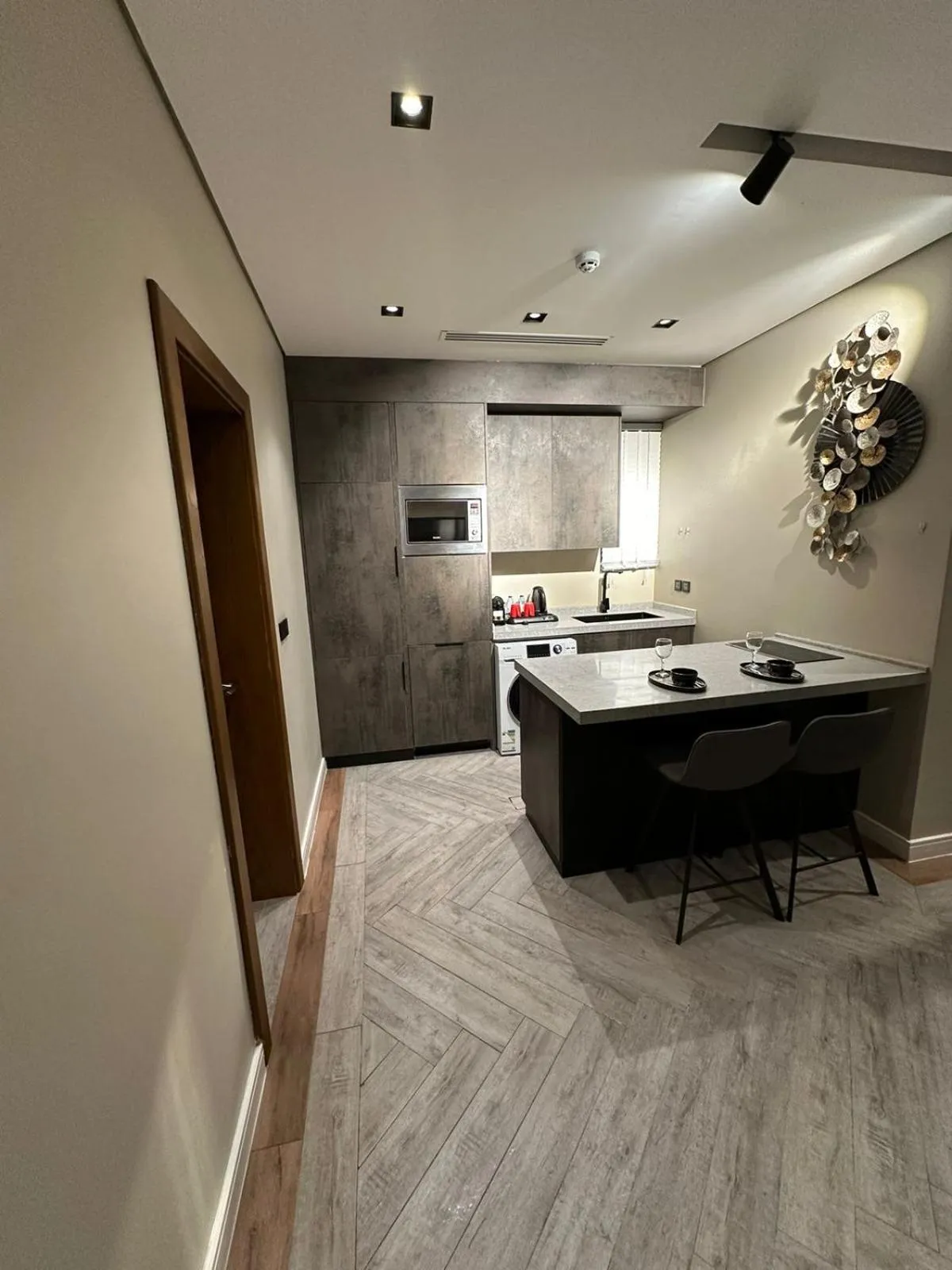 Kitchen or kitchenette in Voyage Residence فوياج ريسيدنس للشقق المخدومة