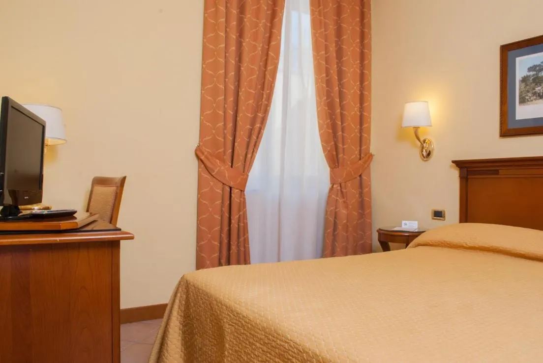 Photo of the whole room, Bed in Le Cheminée Business Hotel Napoli