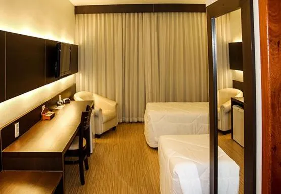 Bed in Hotel Mirante São Brás