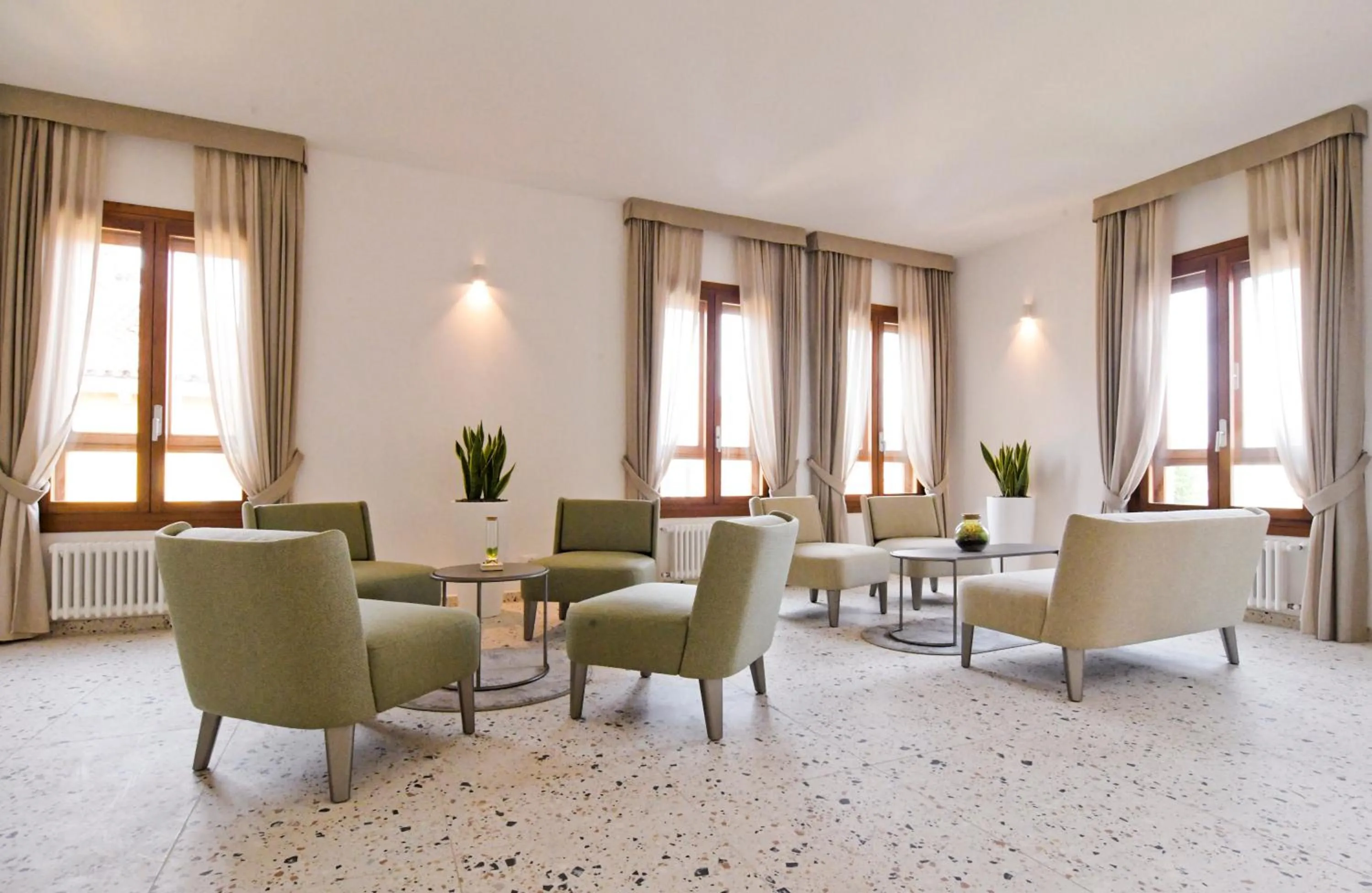 Communal lounge/ TV room in Maison Boutique Al Redentore