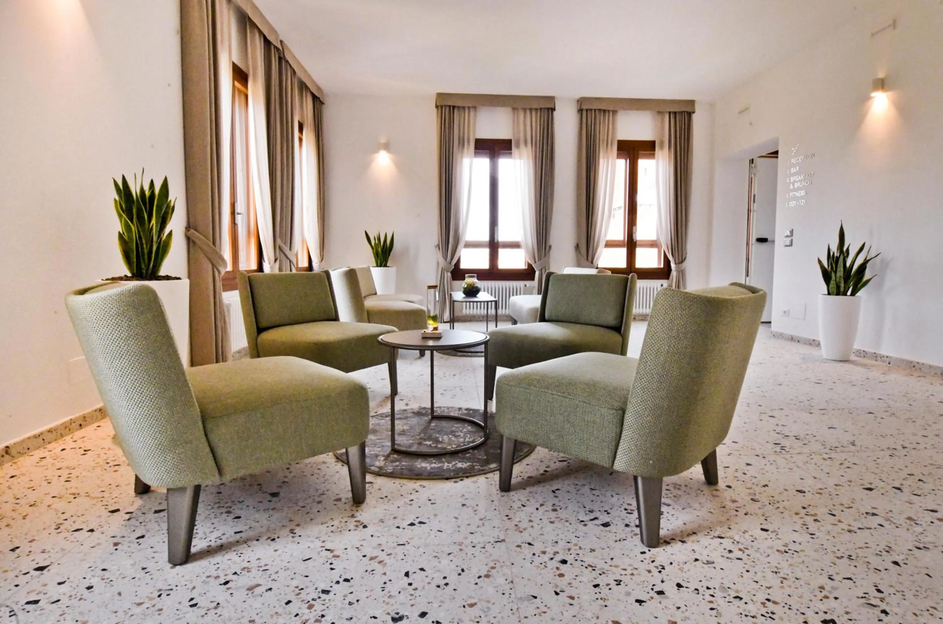 Communal lounge/ TV room in Maison Boutique Al Redentore