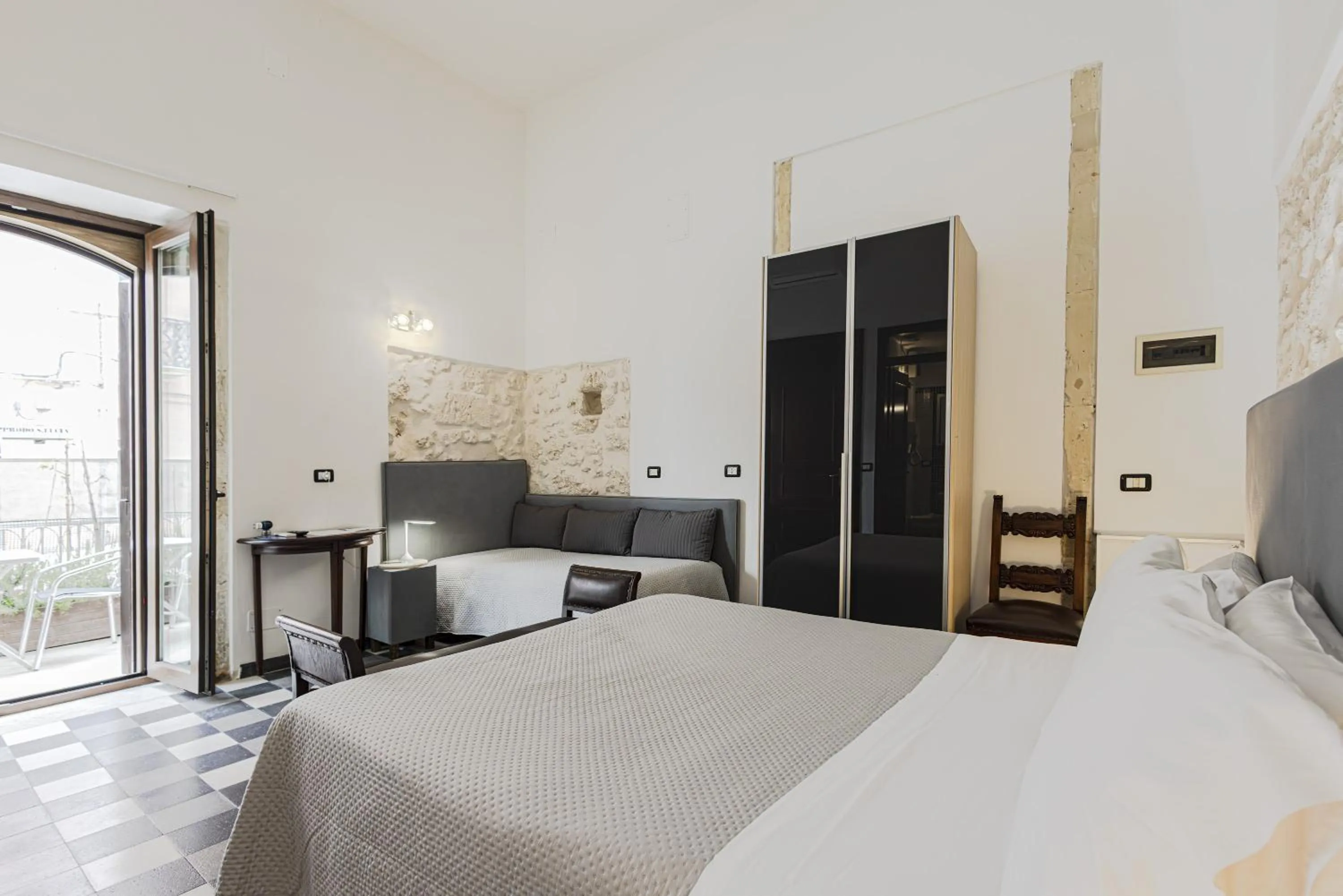 Bed in Lakkios charming suites and rooms