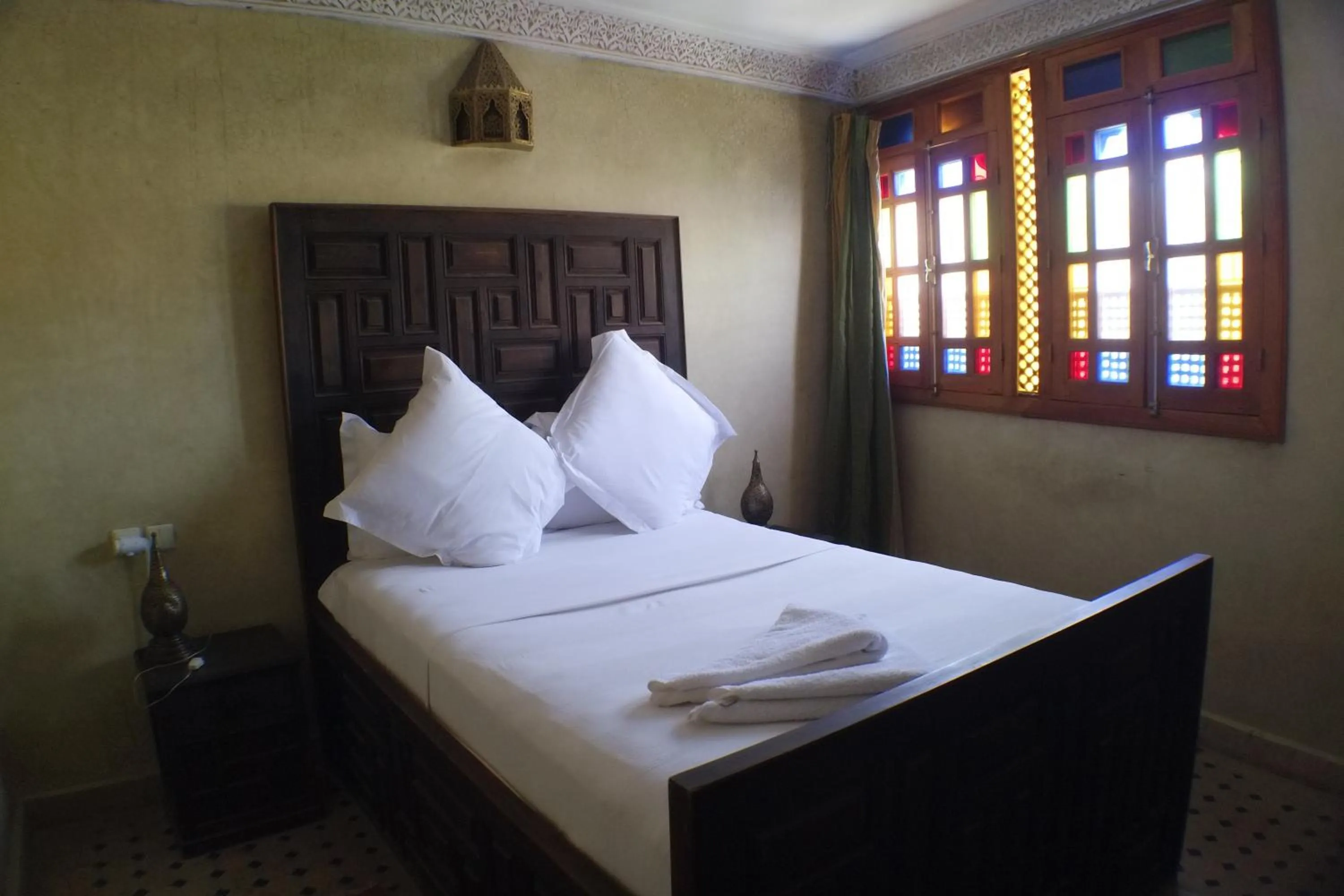 Bed in Riad Layalina Fes