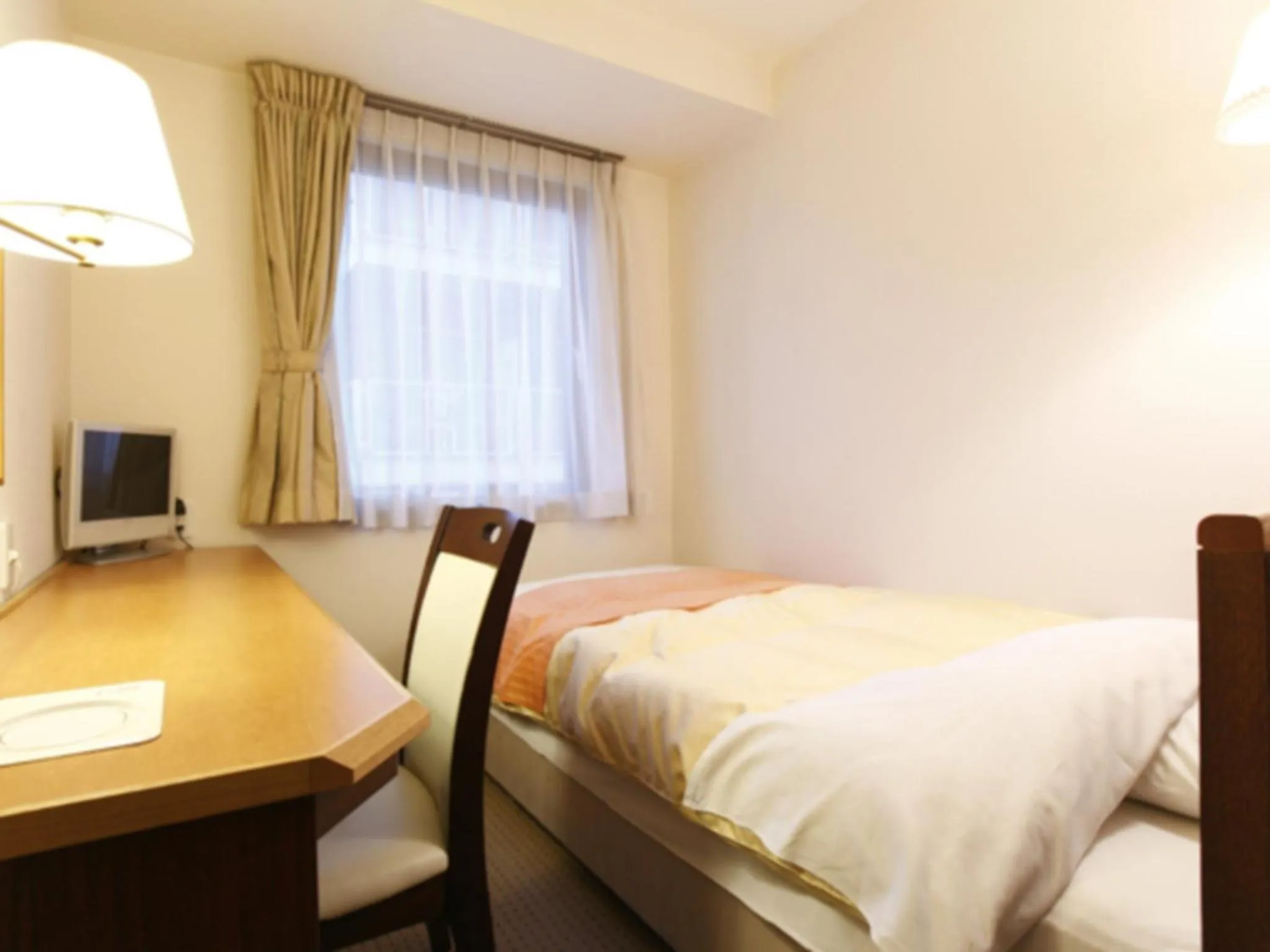 Photo of the whole room, Bed in Hotel New Ueno