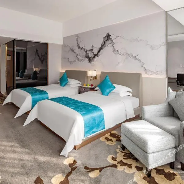 Bed in Huaqiang Plaza Hotel Shenzhen, Enjoy Complimentary Mini Bar & Night Snack, Add breakfast - enjoy complimentary afternoon tea