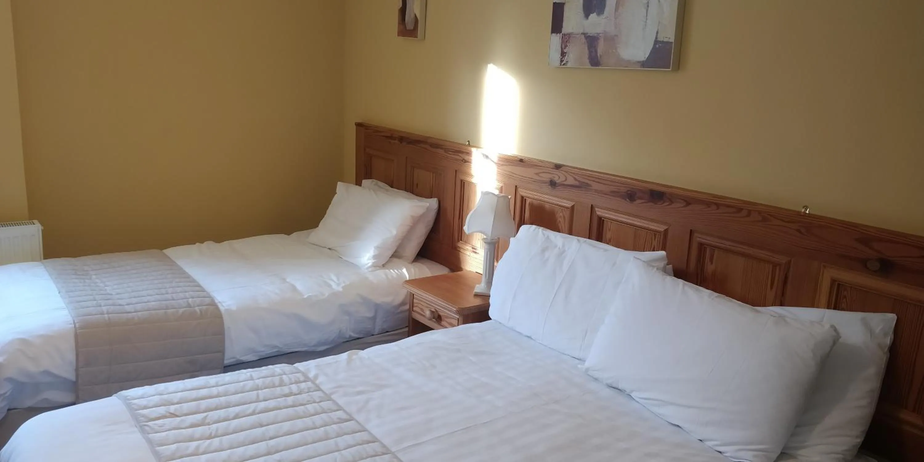 Bed in Avonmore House Guest Accommodation