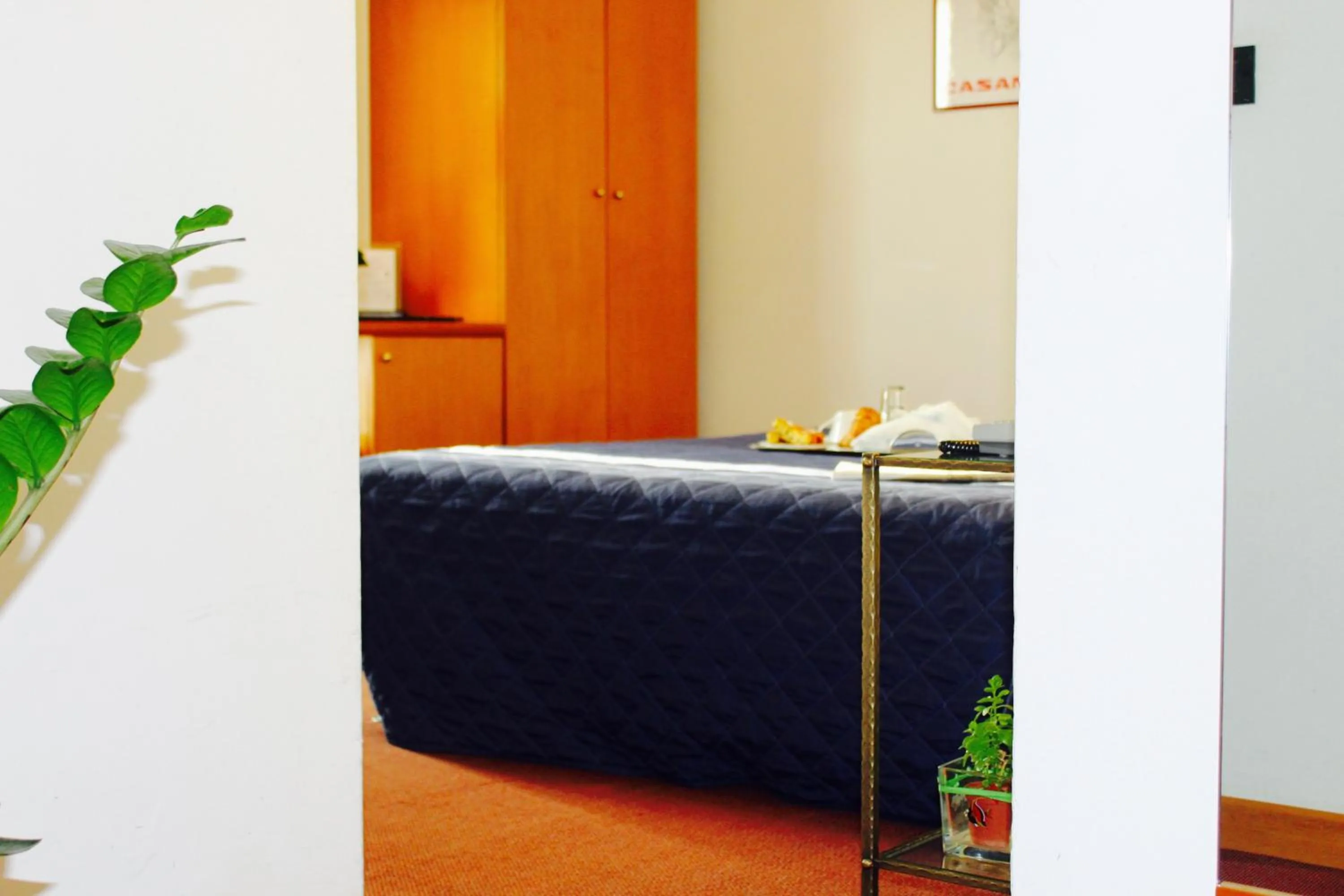 Bed in Arcangelo Roof Hotel