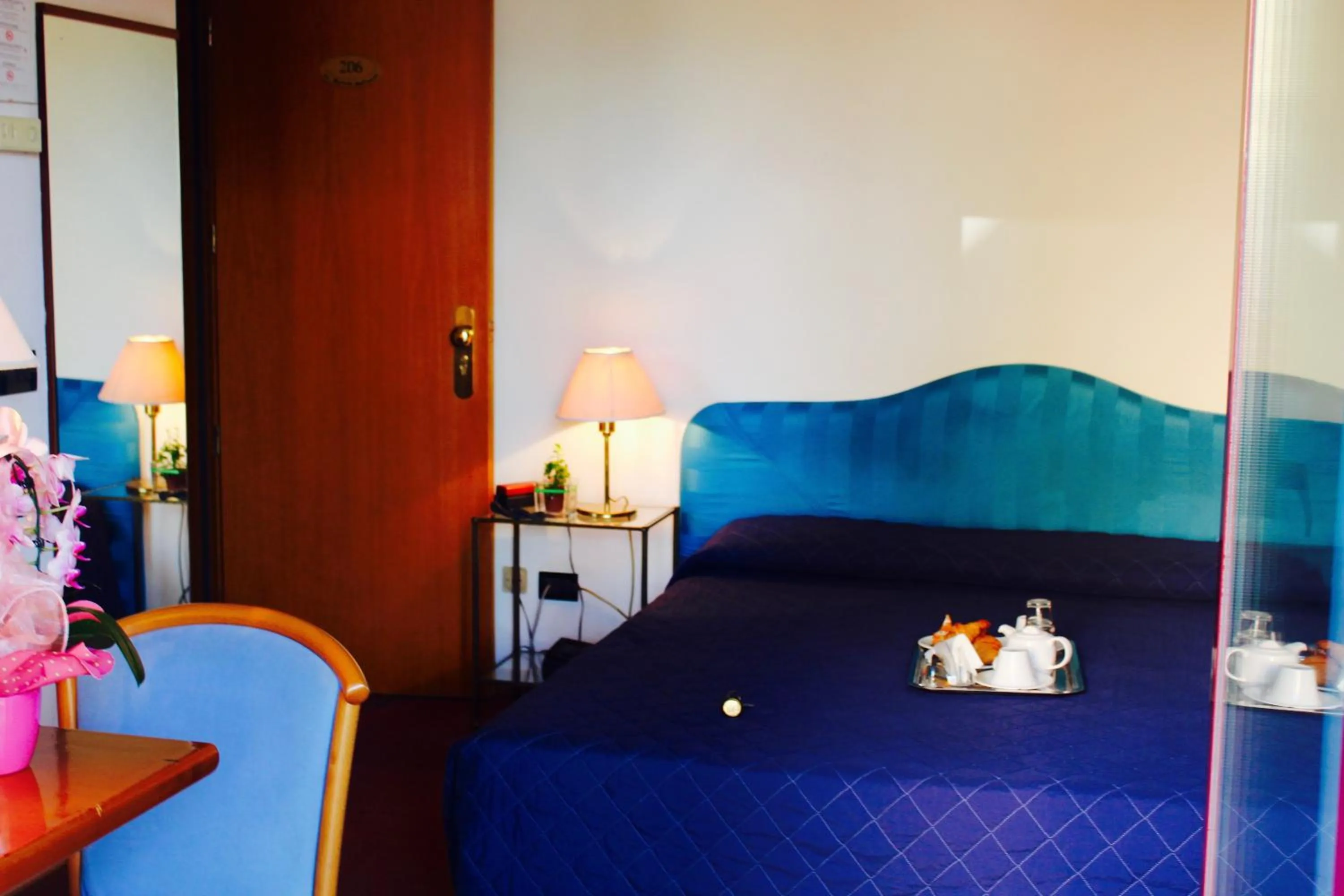 Bed in Arcangelo Roof Hotel