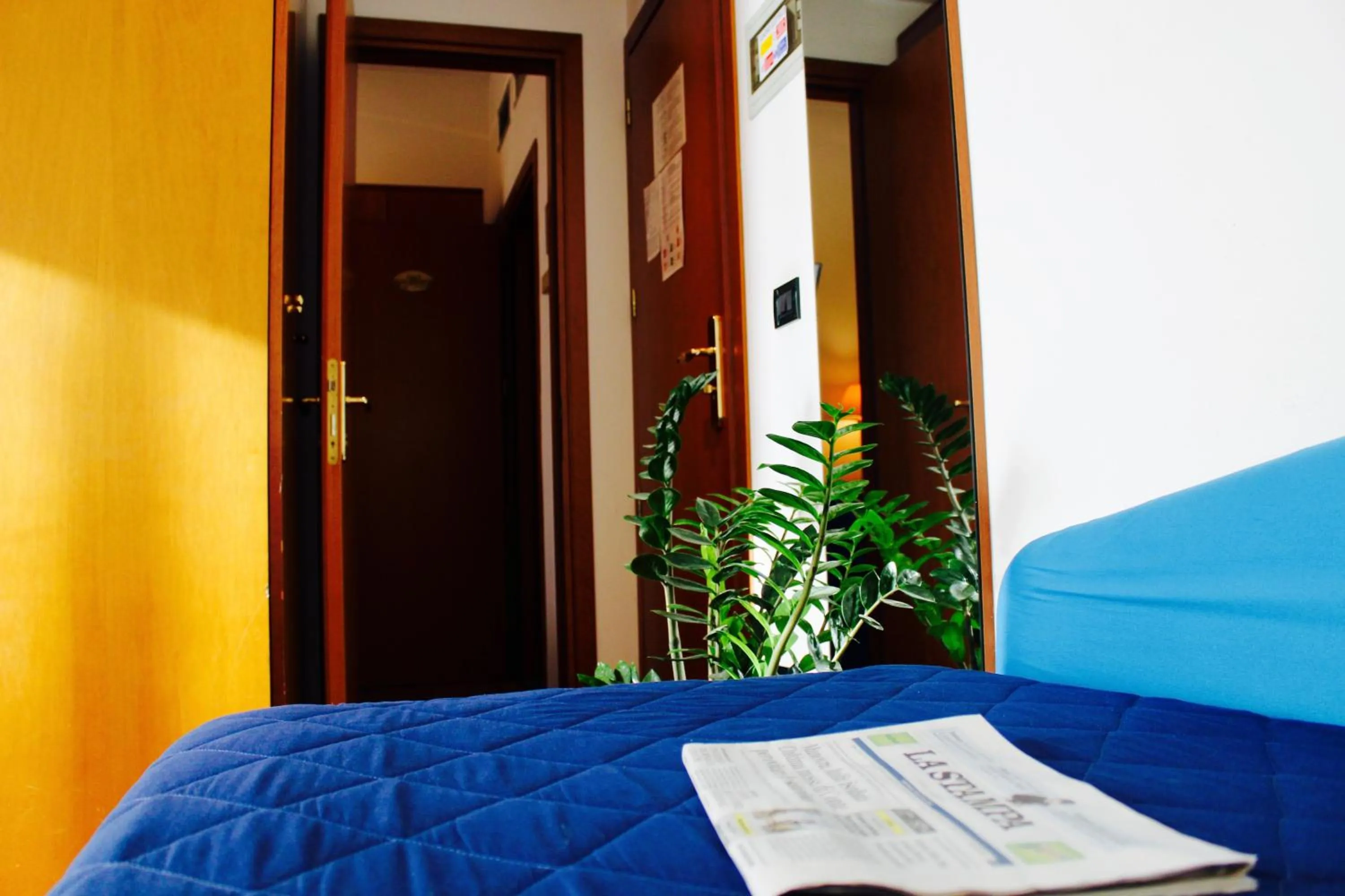 Bed in Arcangelo Roof Hotel