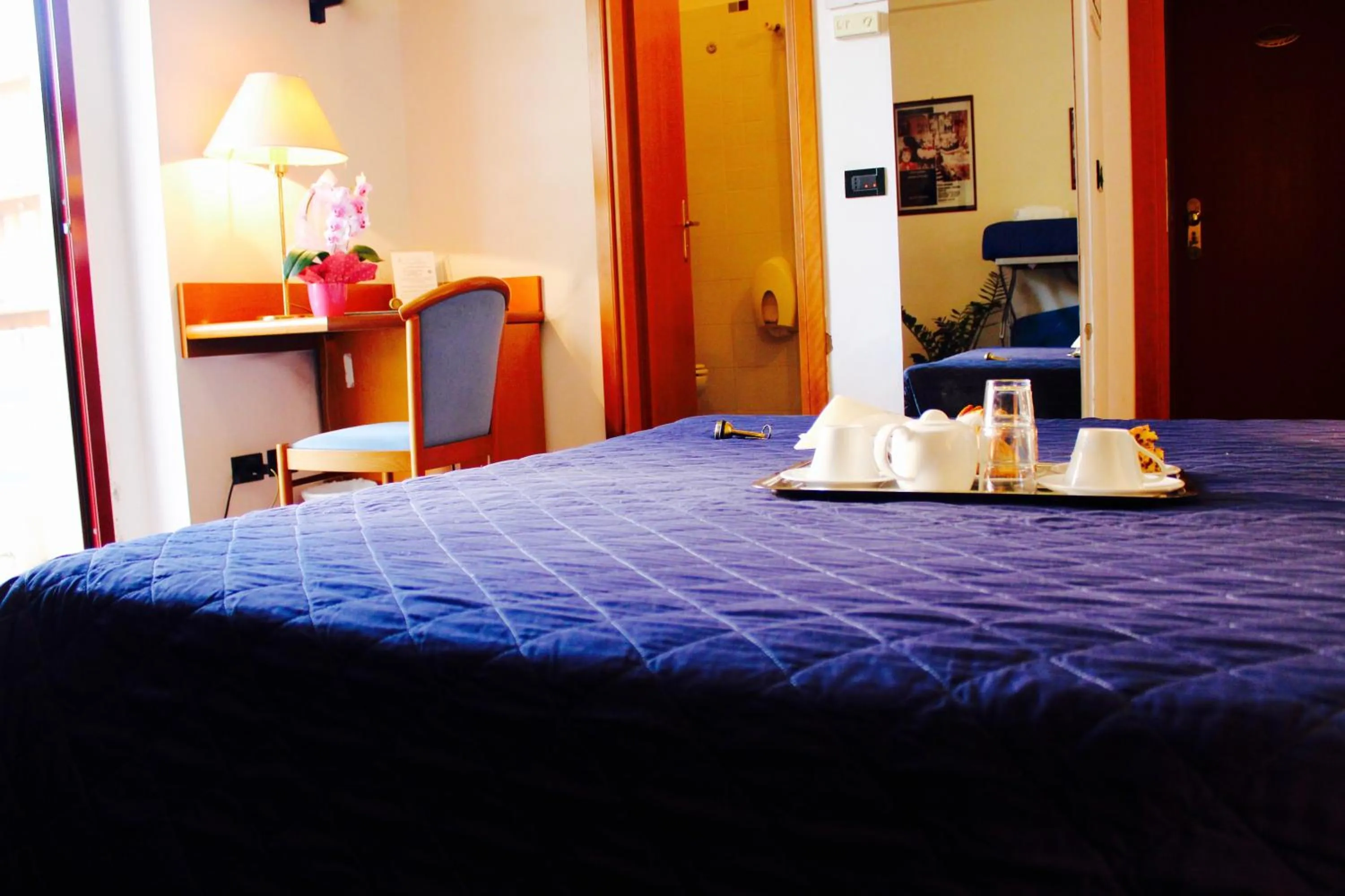 Bed in Arcangelo Roof Hotel