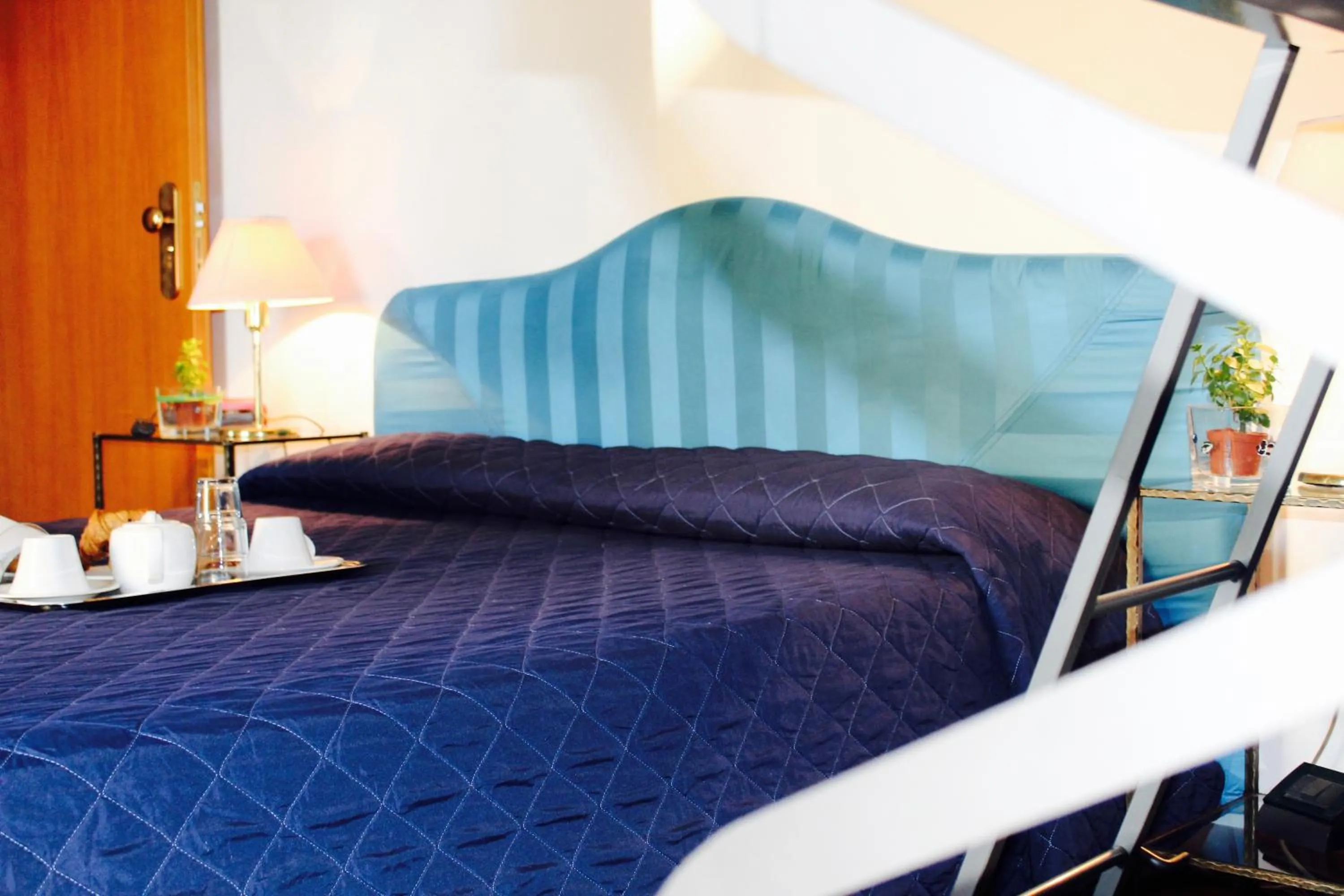 Bed in Arcangelo Roof Hotel