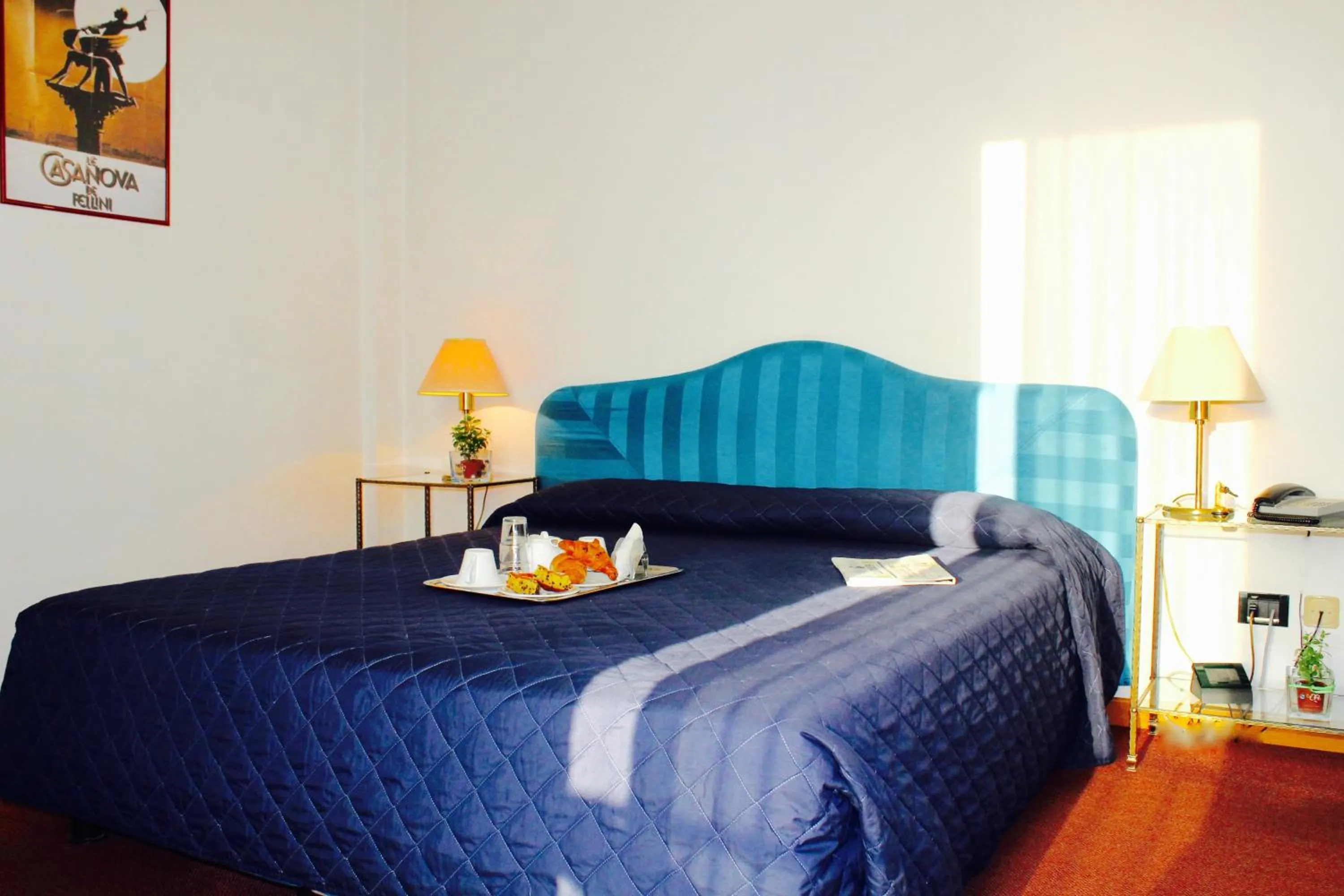 Bed in Arcangelo Roof Hotel