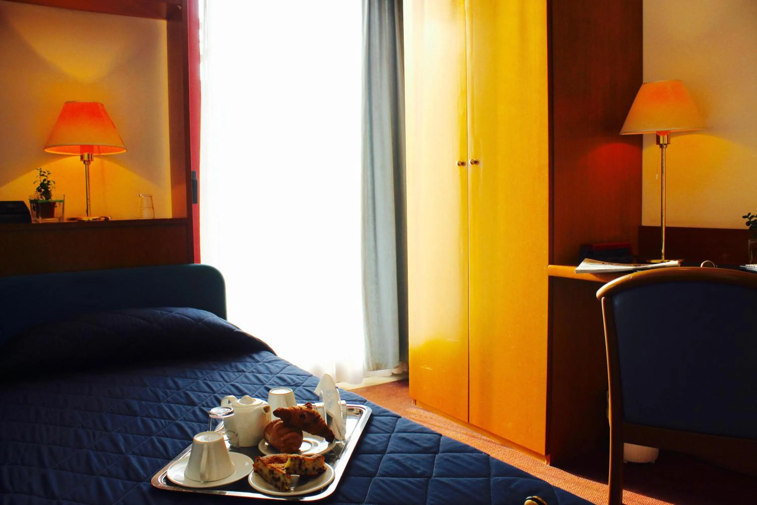 Bed in Arcangelo Roof Hotel