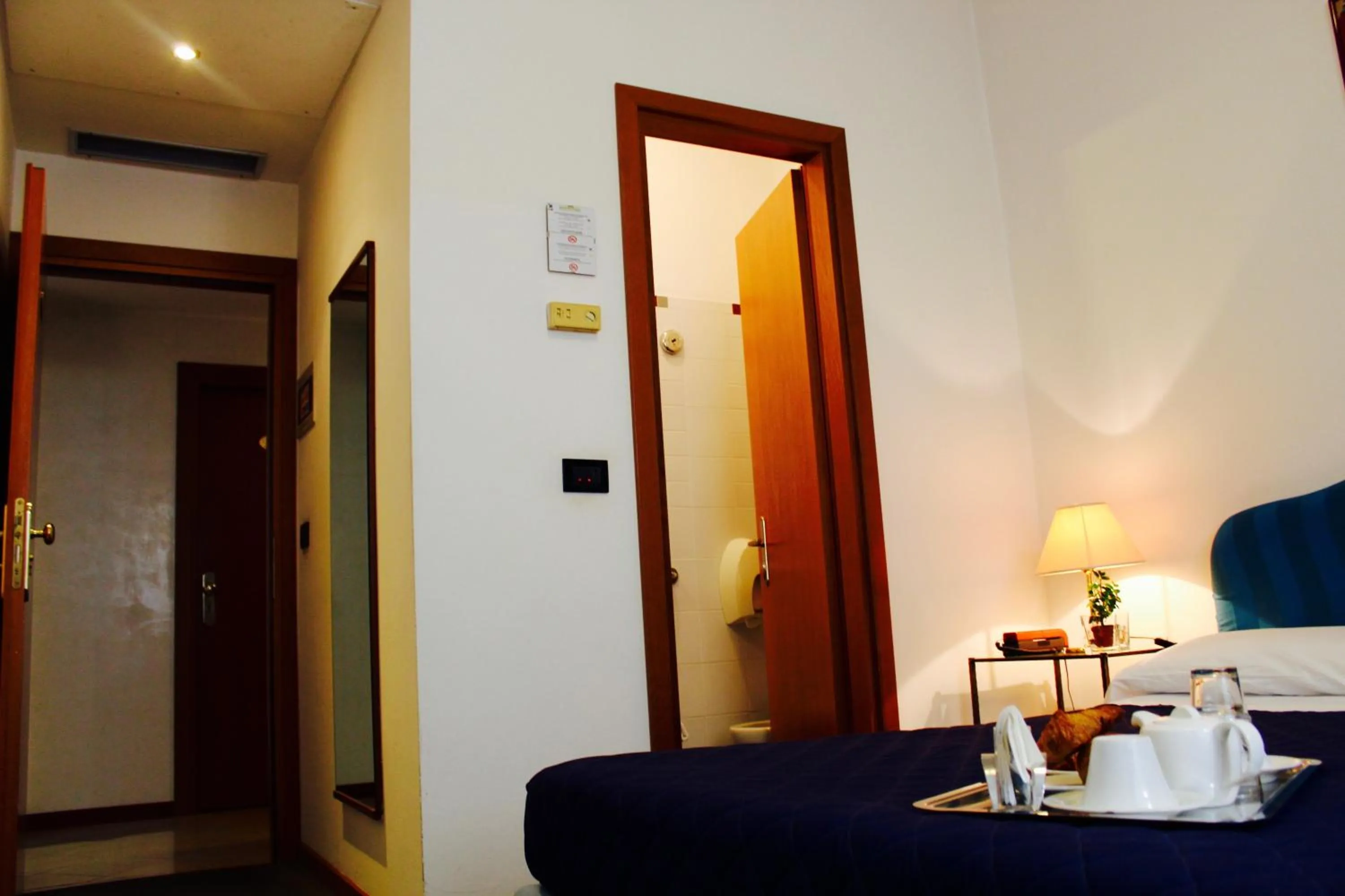 Bed in Arcangelo Roof Hotel