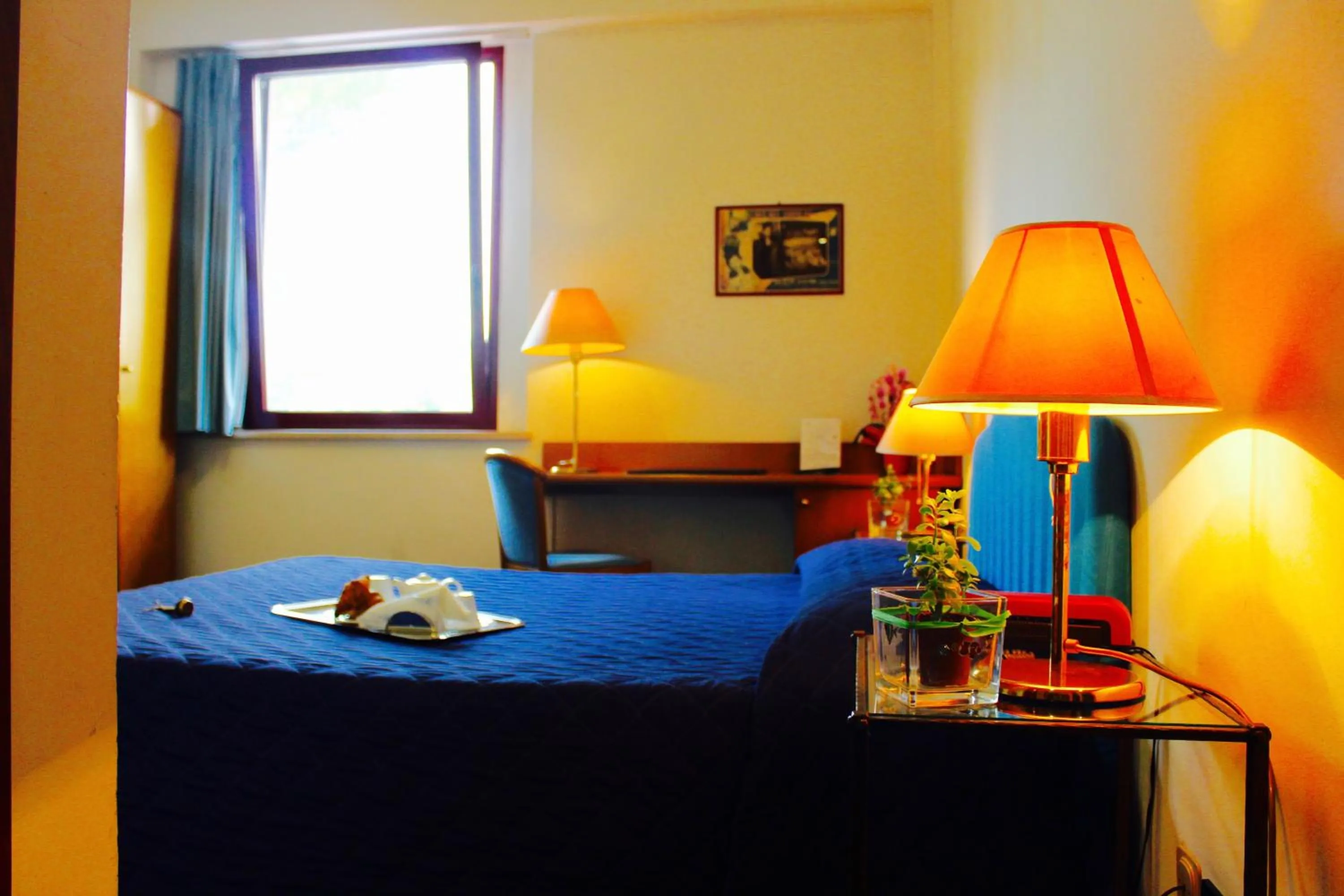Bed in Arcangelo Roof Hotel