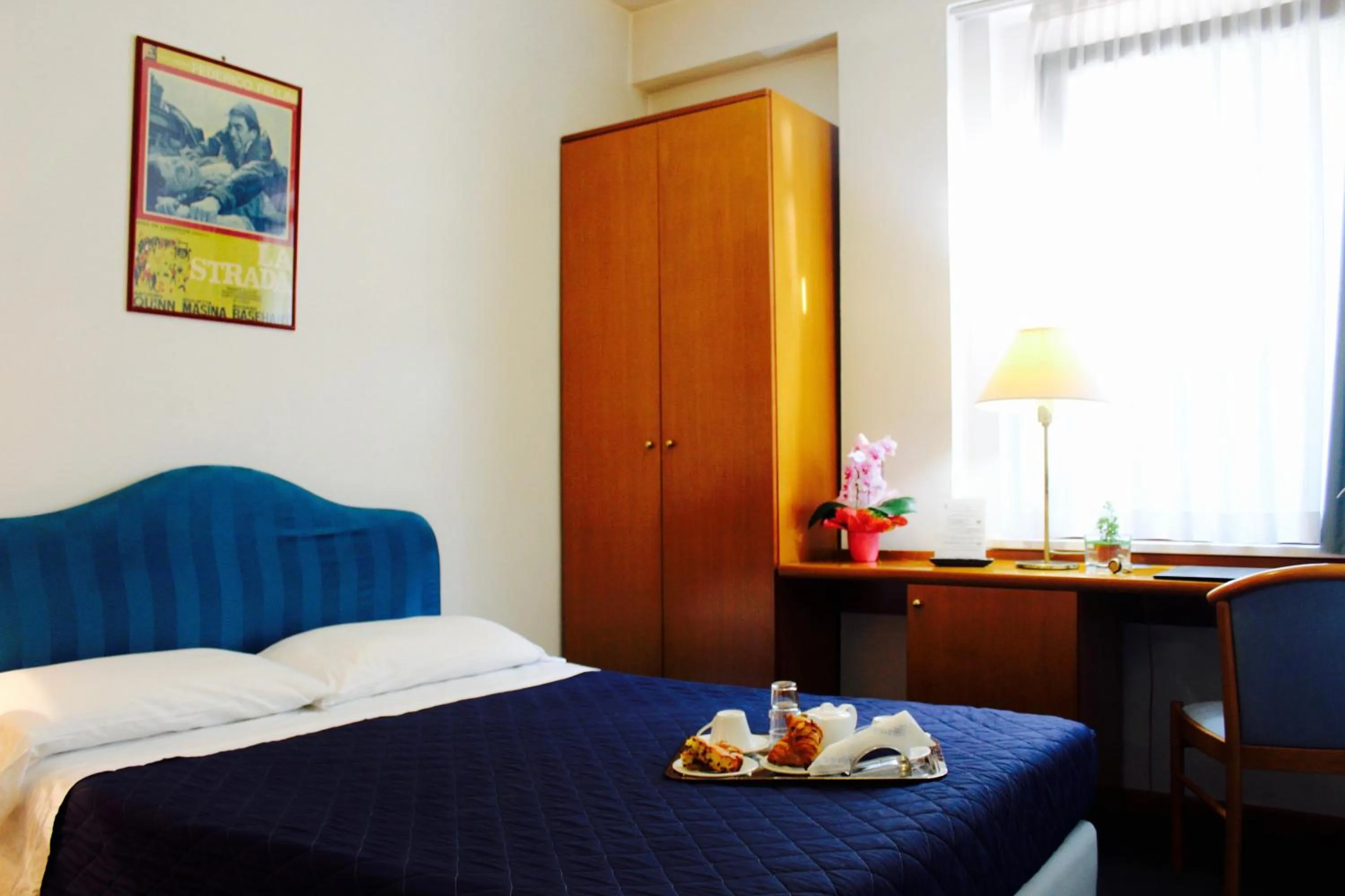 Bed in Arcangelo Roof Hotel