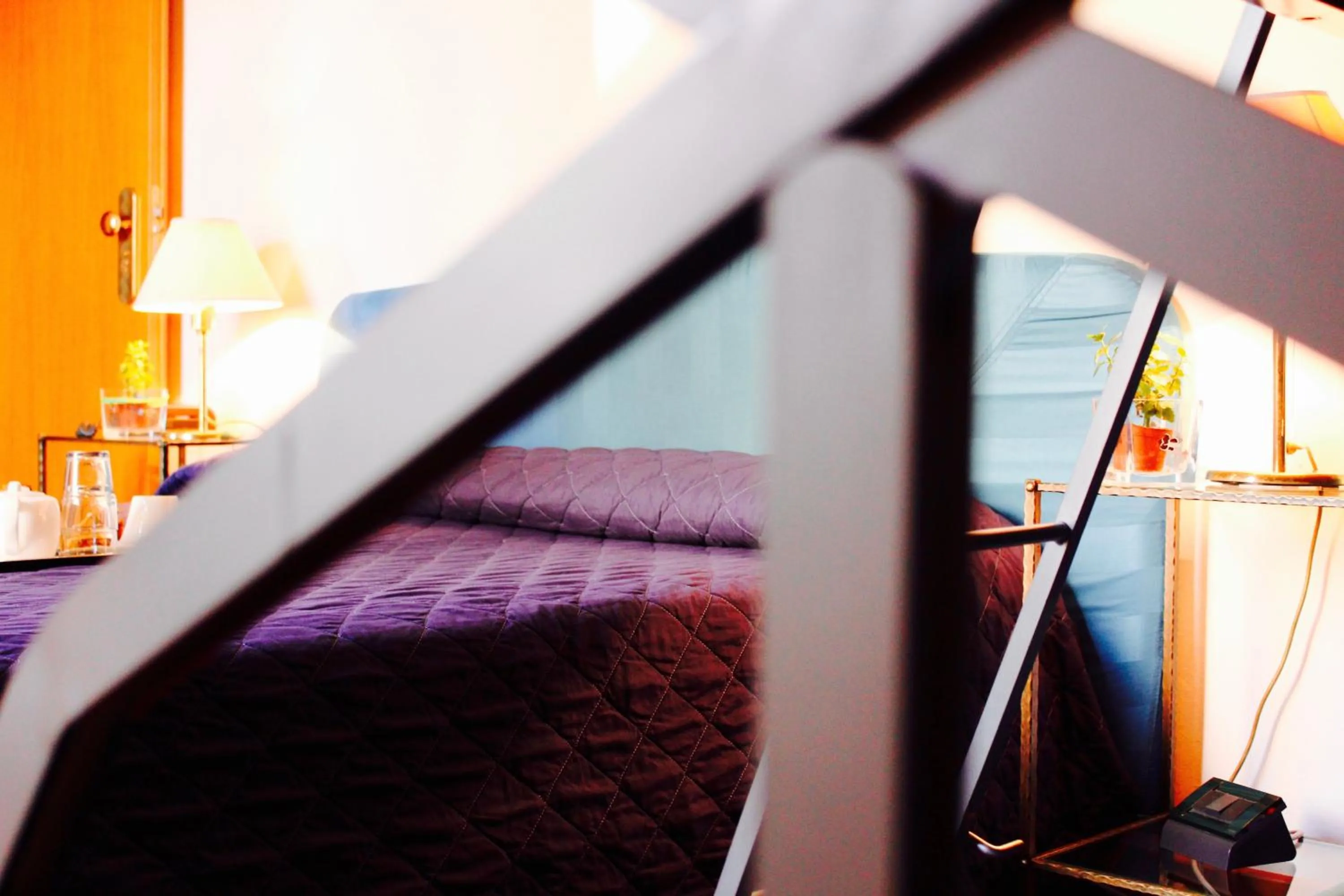 Bed in Arcangelo Roof Hotel