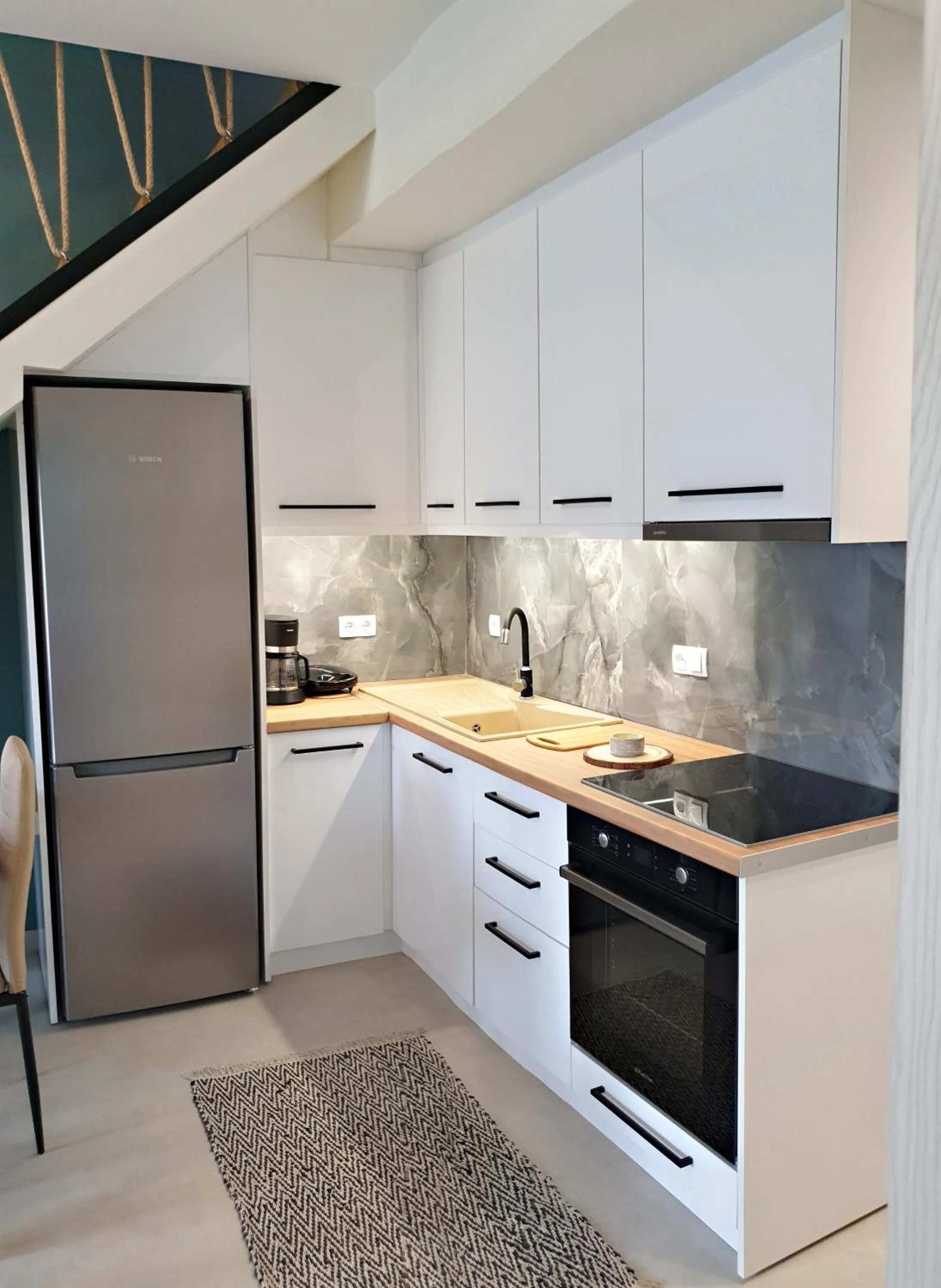 kitchen in Almeta Suites