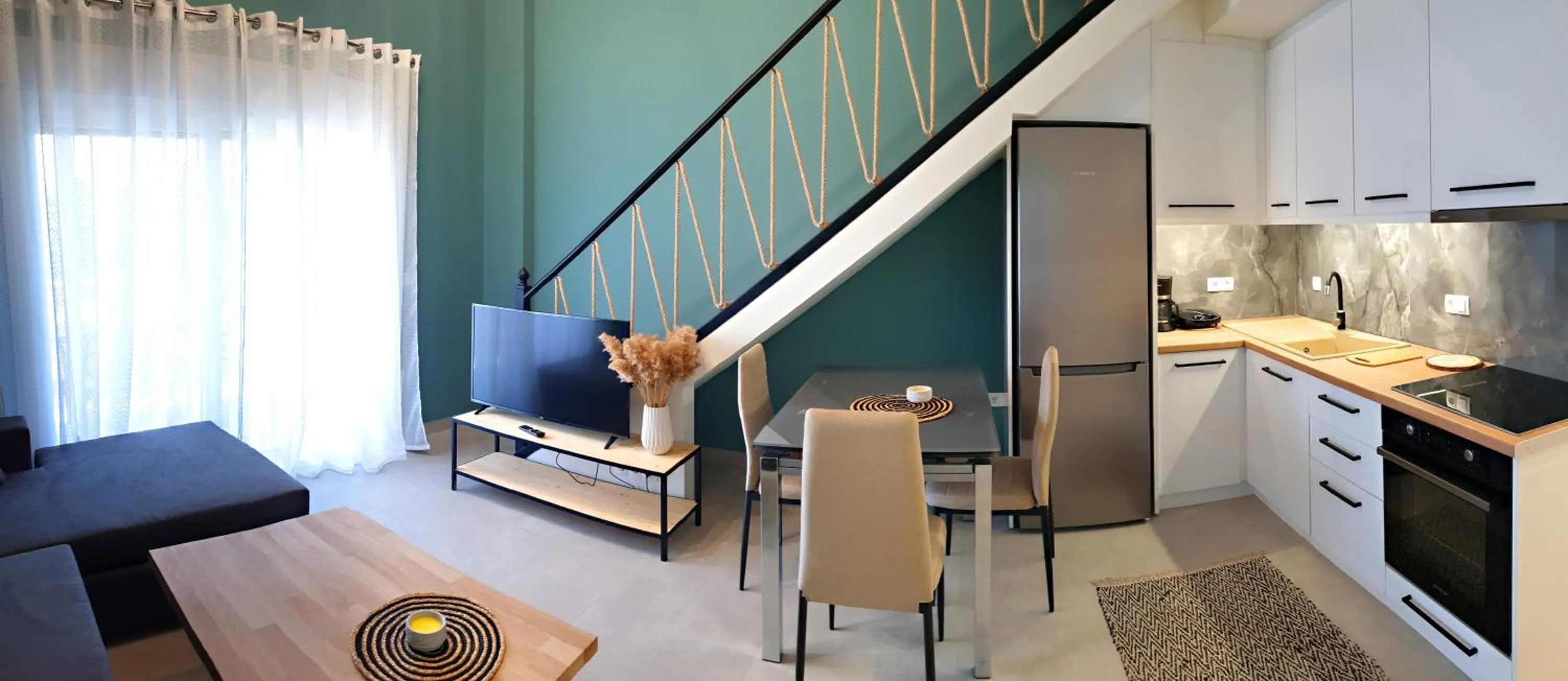 Kitchen or kitchenette in Almeta Suites