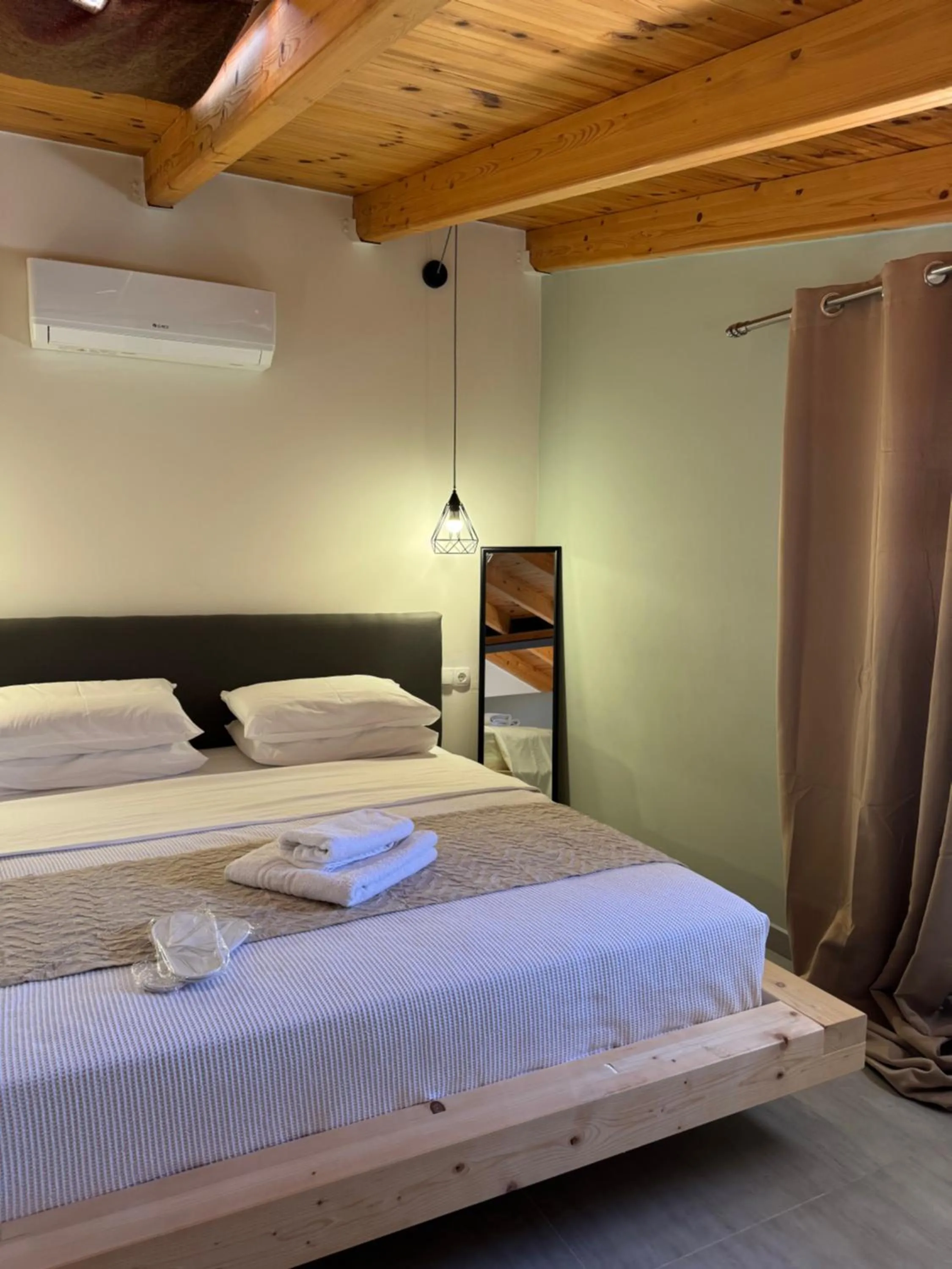 Bed in Almeta Suites