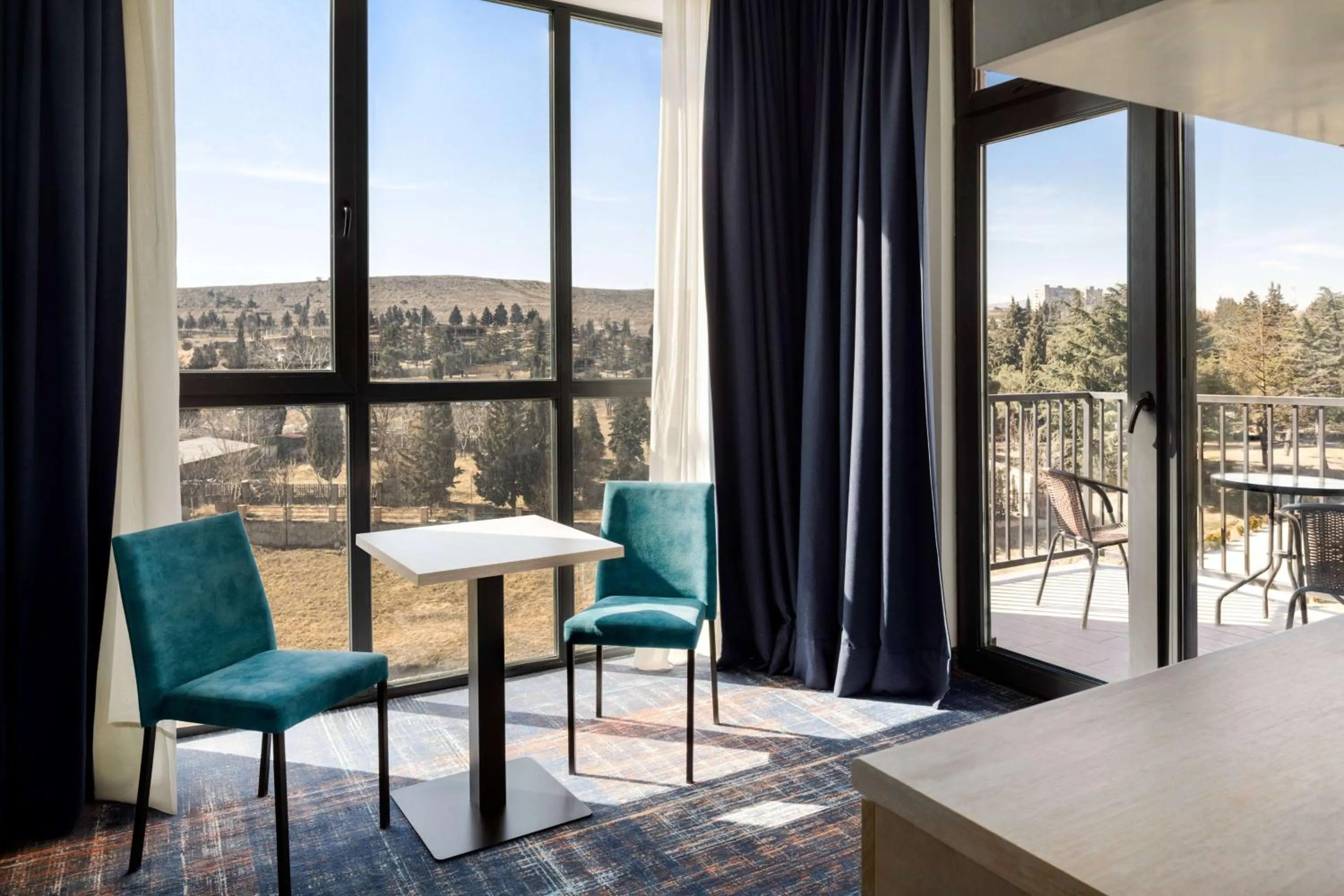 Photo of the whole room in Gino Seaside Tbilisi, Trademark Collection by Wyndham