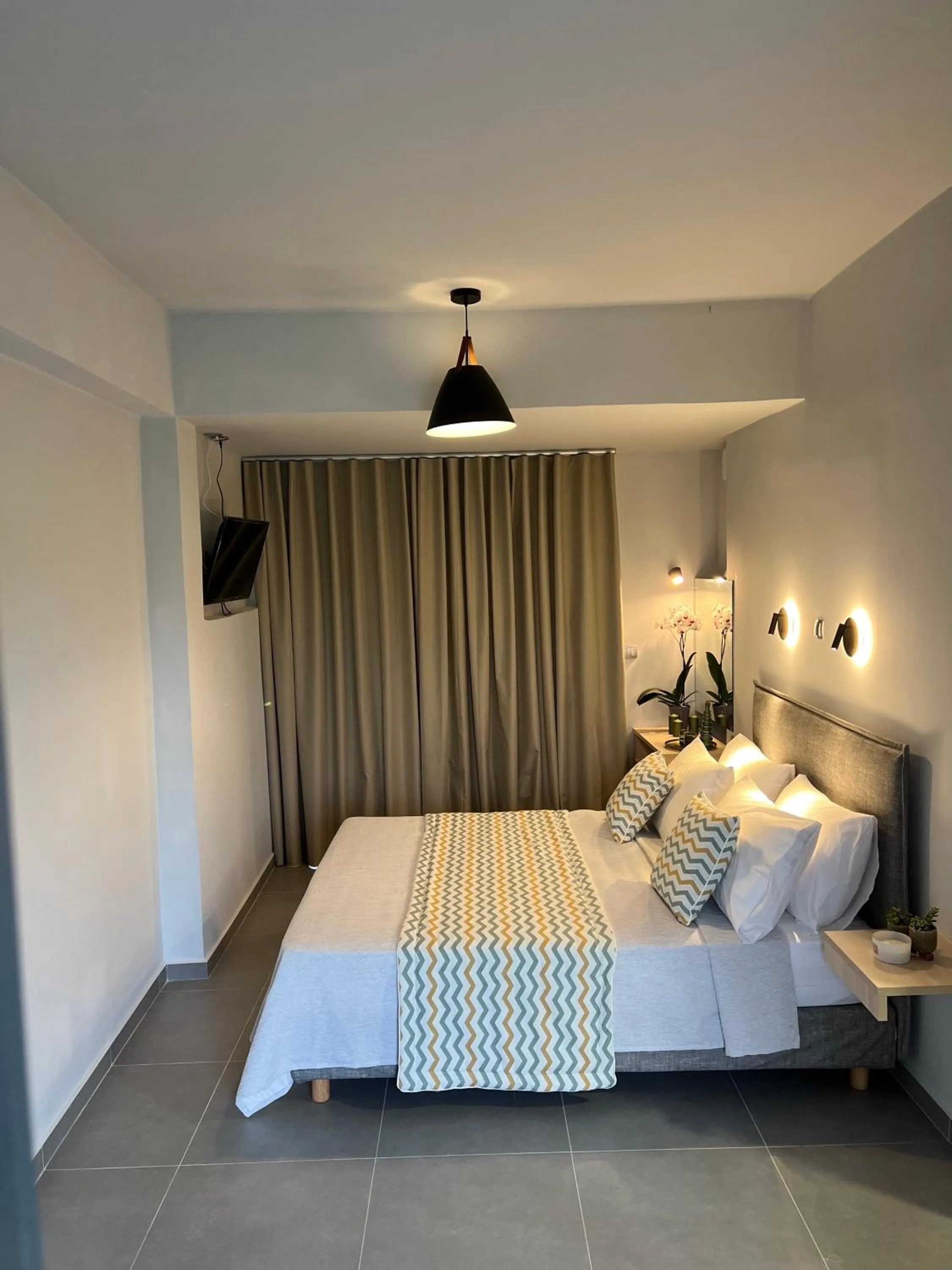 Bed in Κimiro Hotel Tsilivi