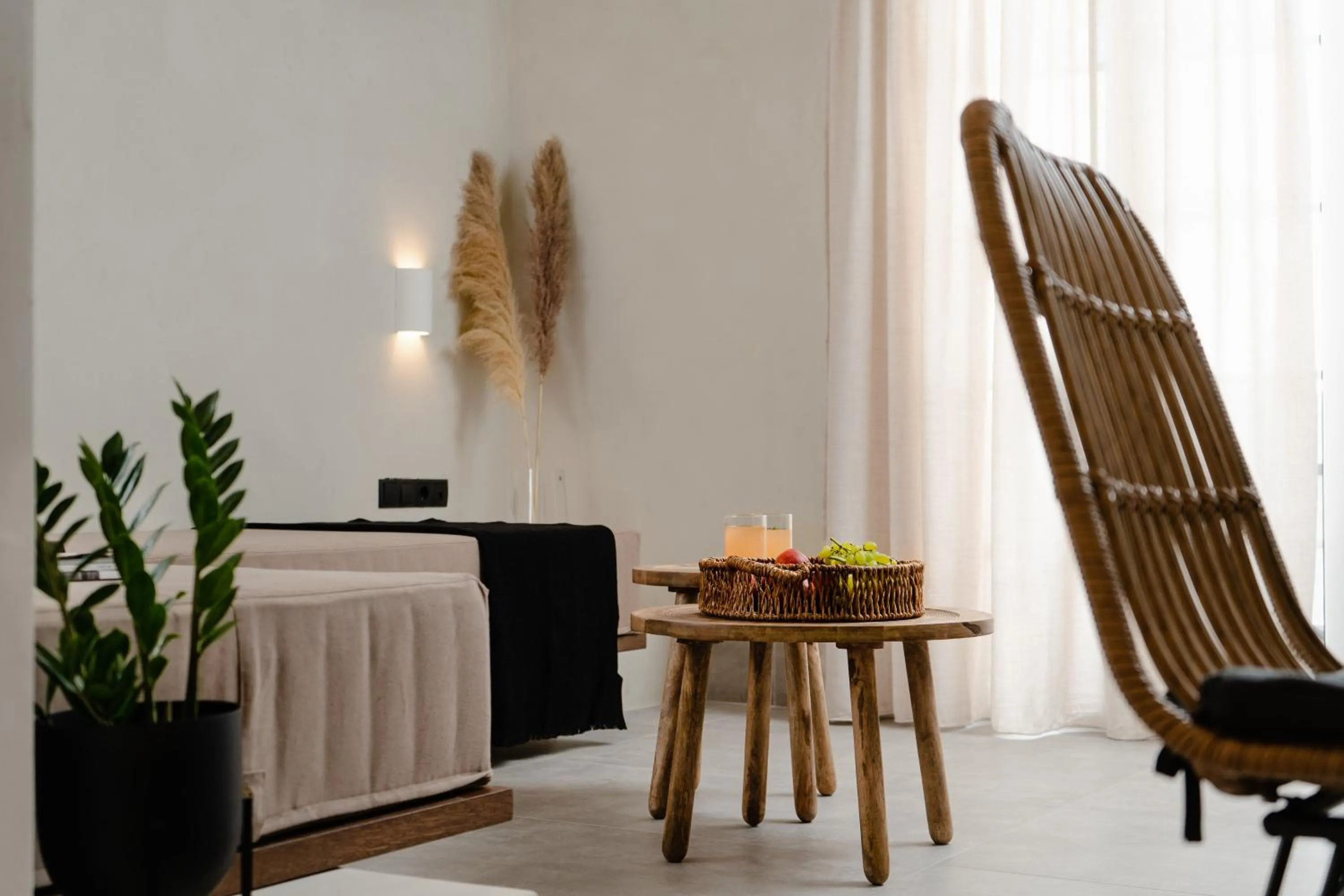 Living room, Bed in Polis of Naxos Stylish Suites