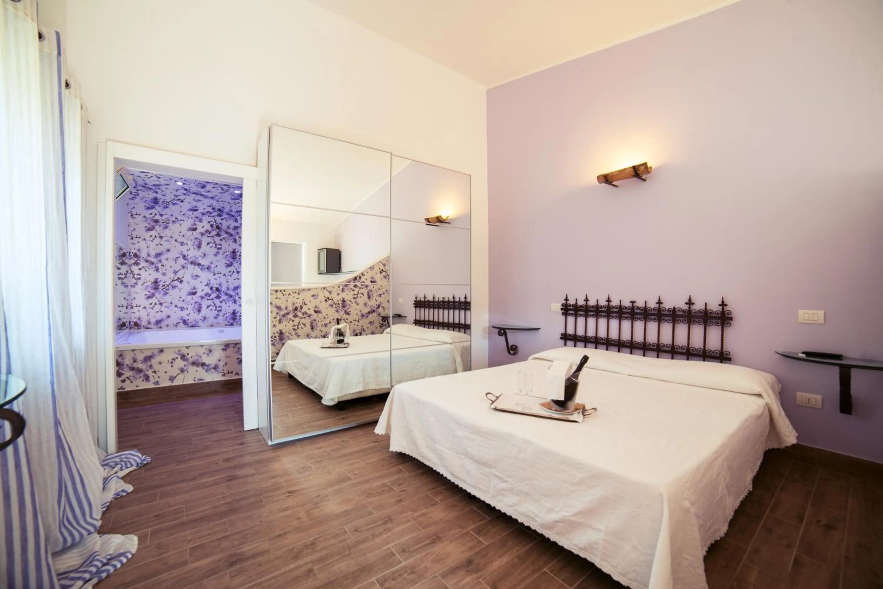 Bed in Hotel Villa Rizzo Resort and Spa