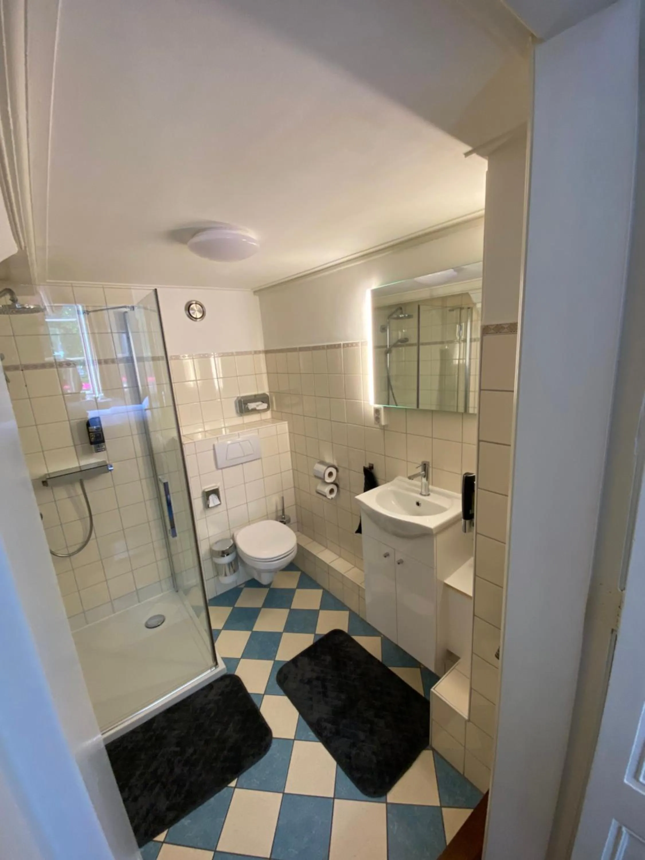 Shower in Logies aan de Dam