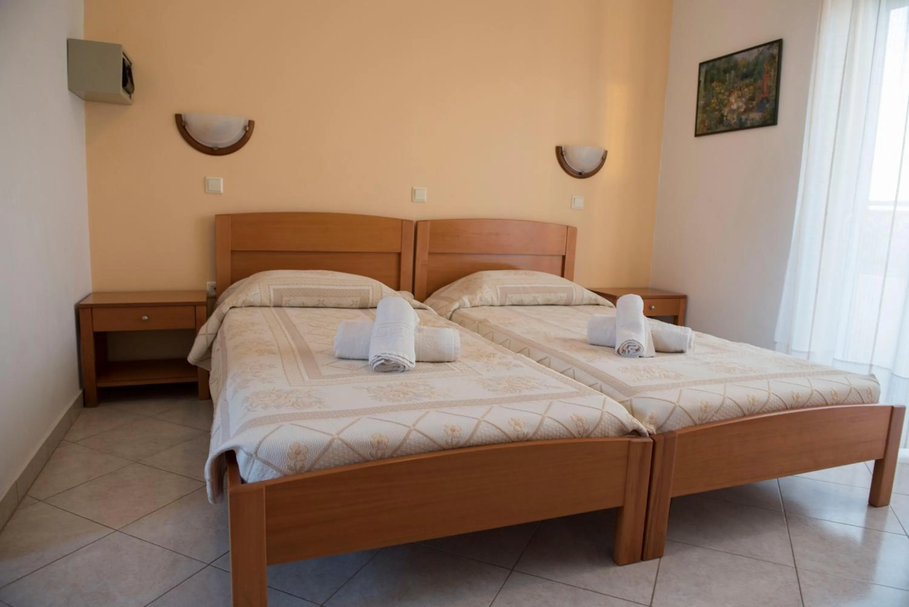 Bed in Nephele Apartments