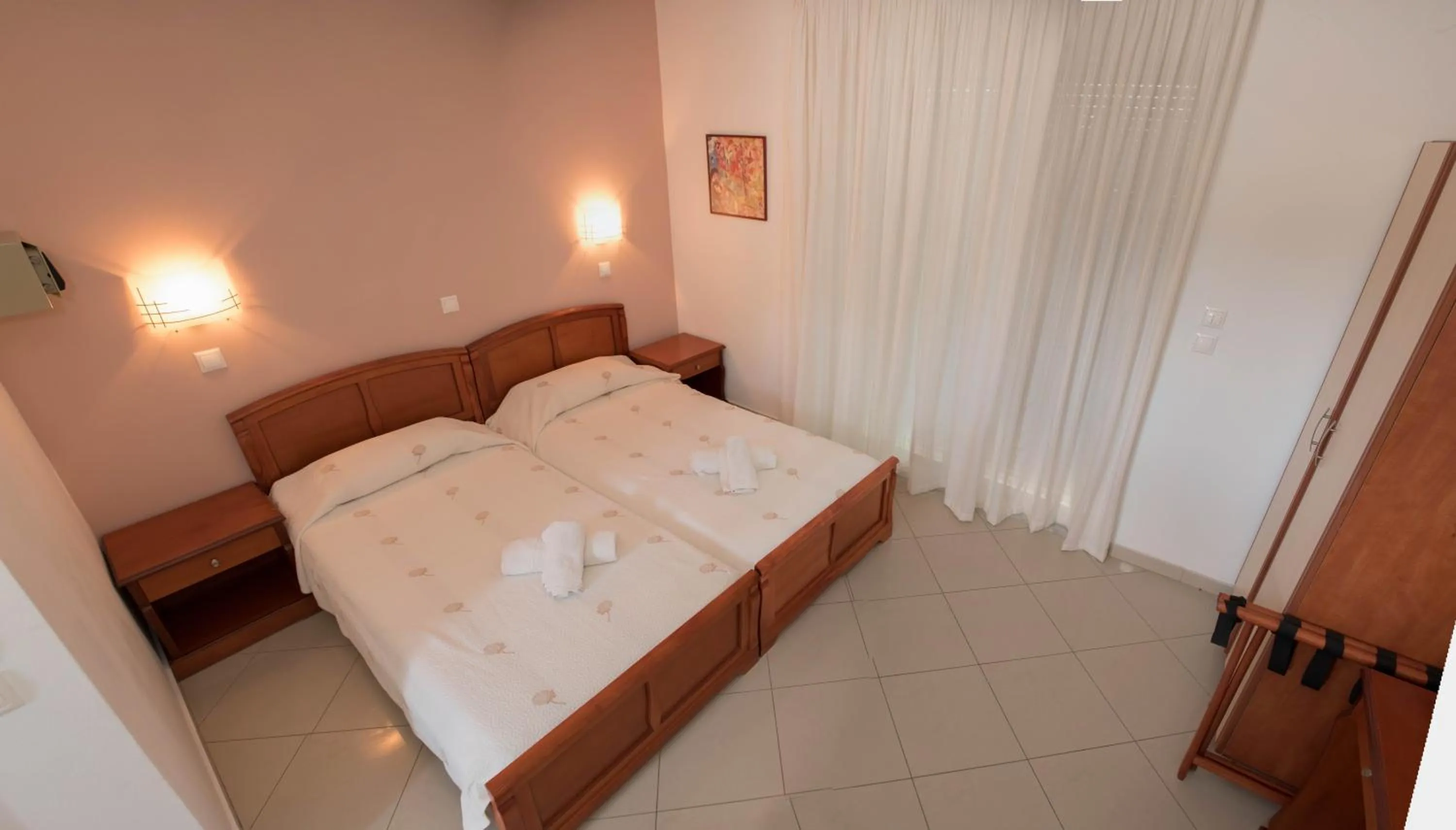 Bed in Nephele Apartments