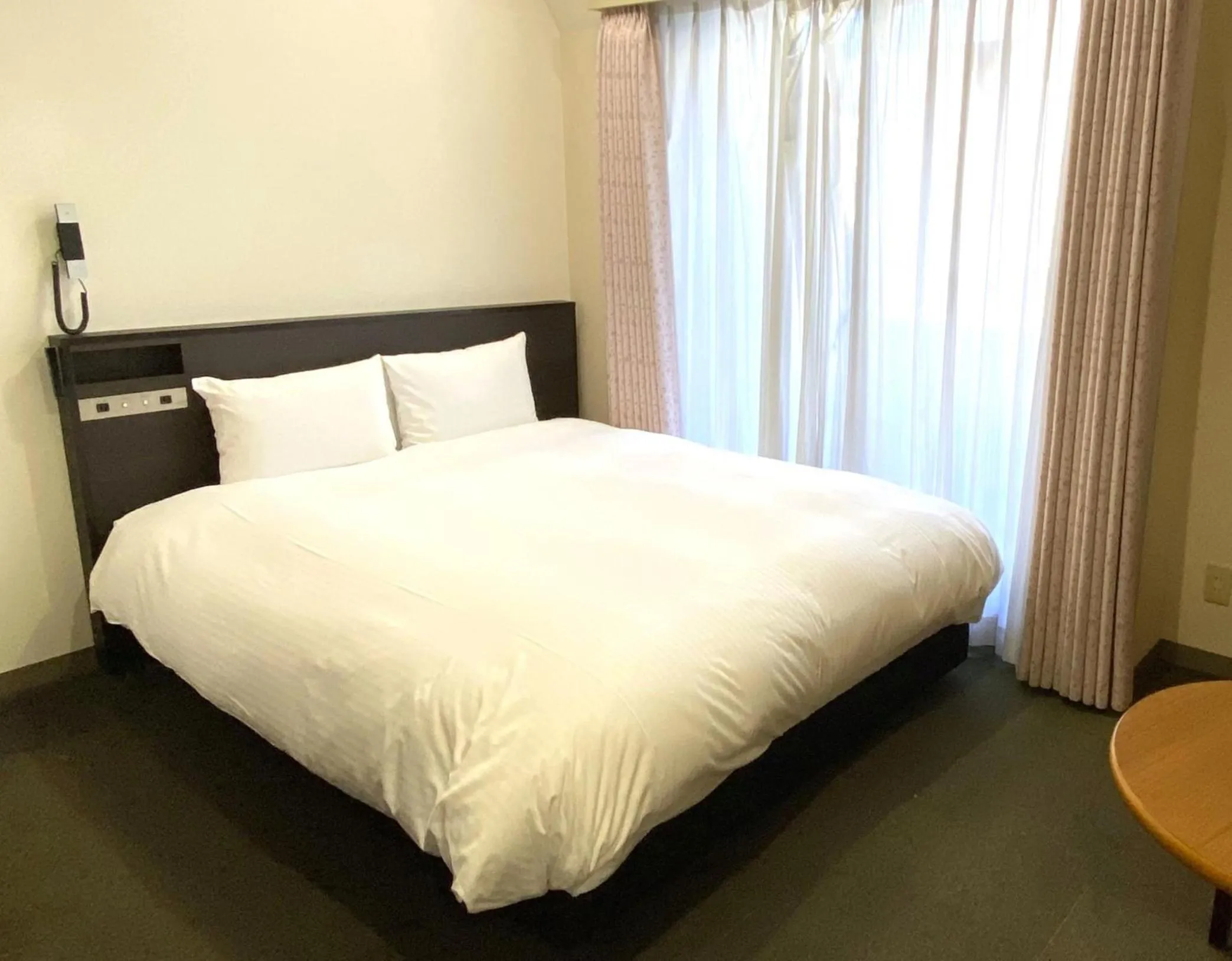 Bed in Hotel Continental Fuchu