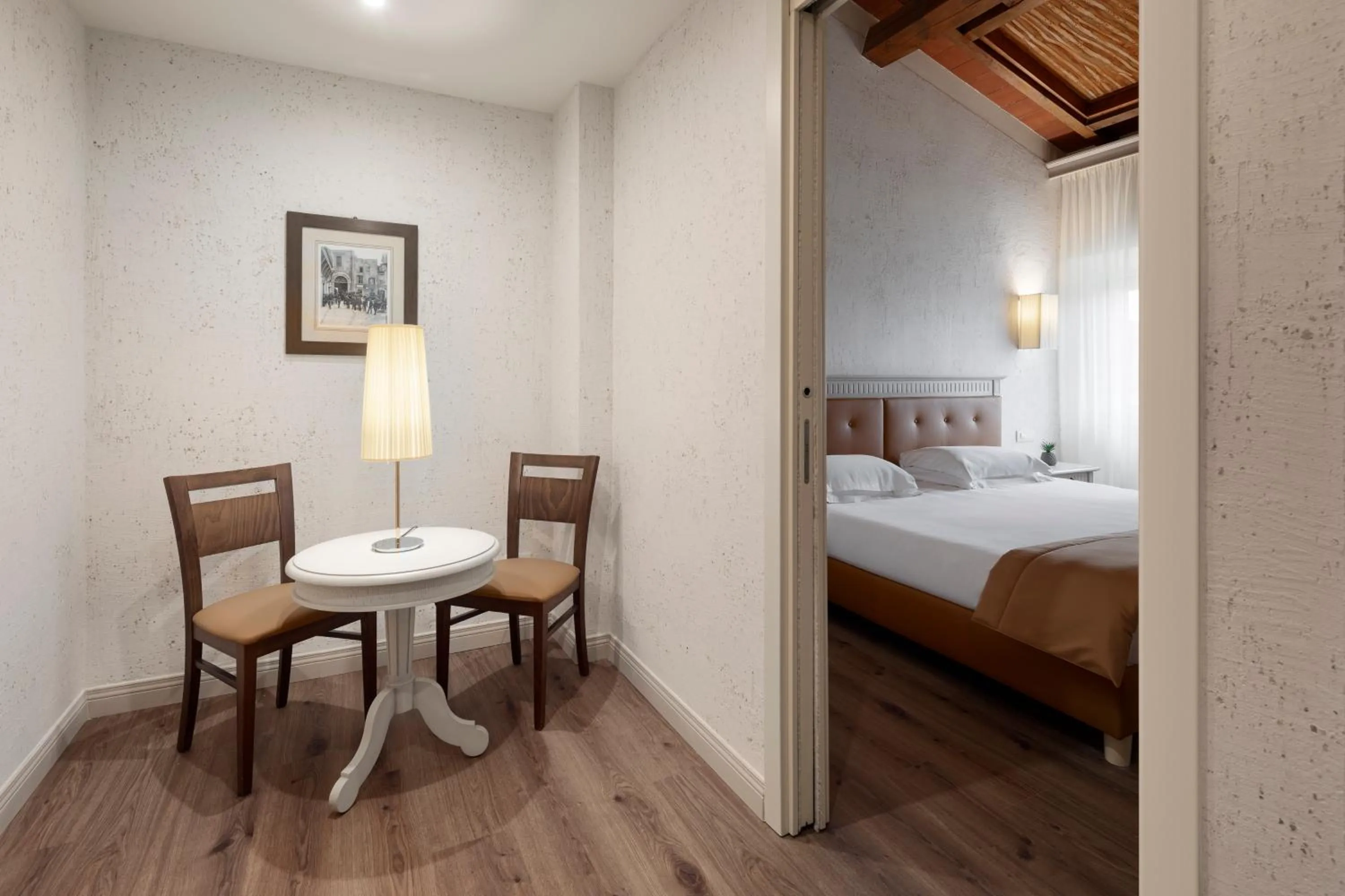 Photo of the whole room, Bed in LHP Certaldo Resort