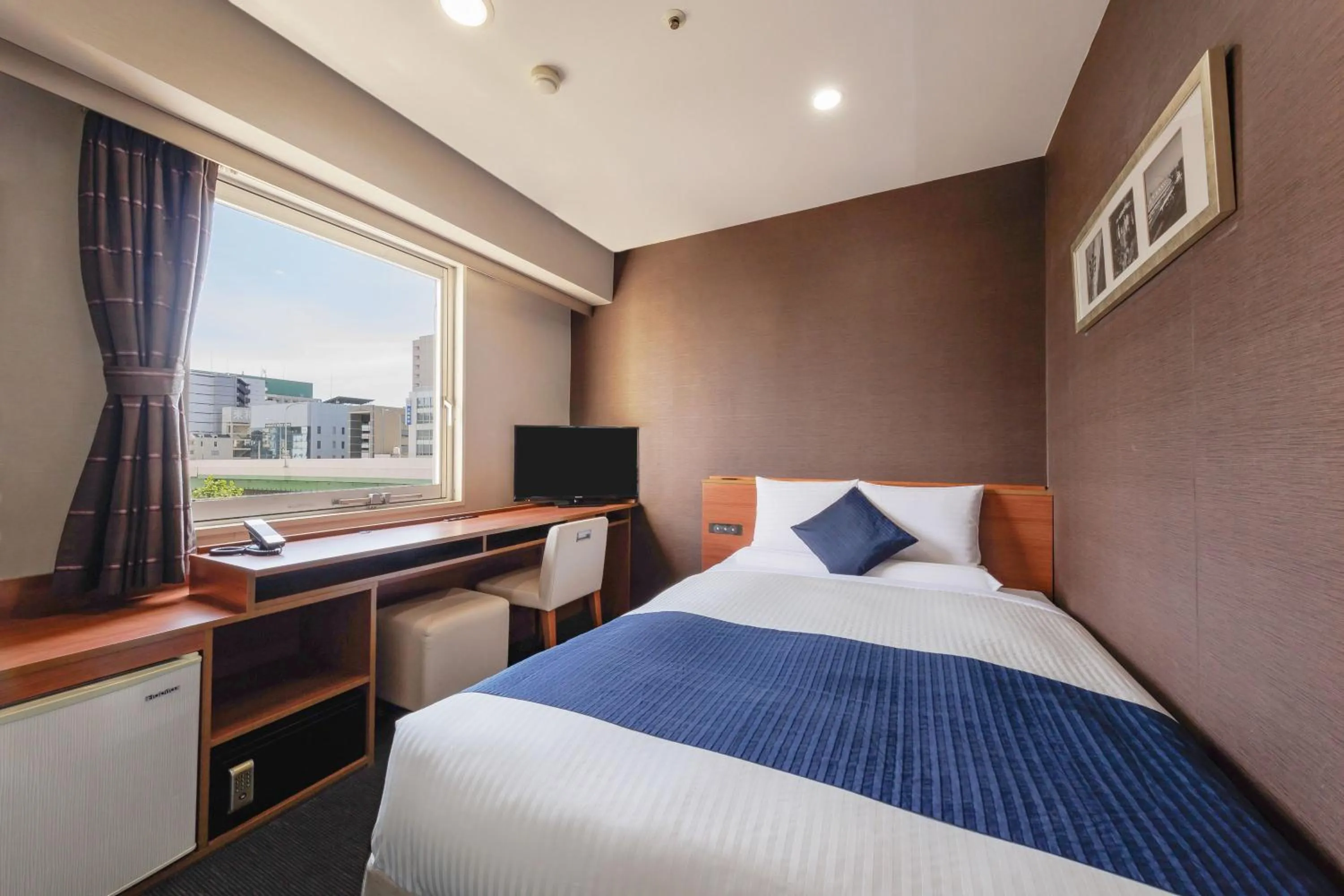 Photo of the whole room, Bed in HOTEL MYSTAYS Nagoya Sakae