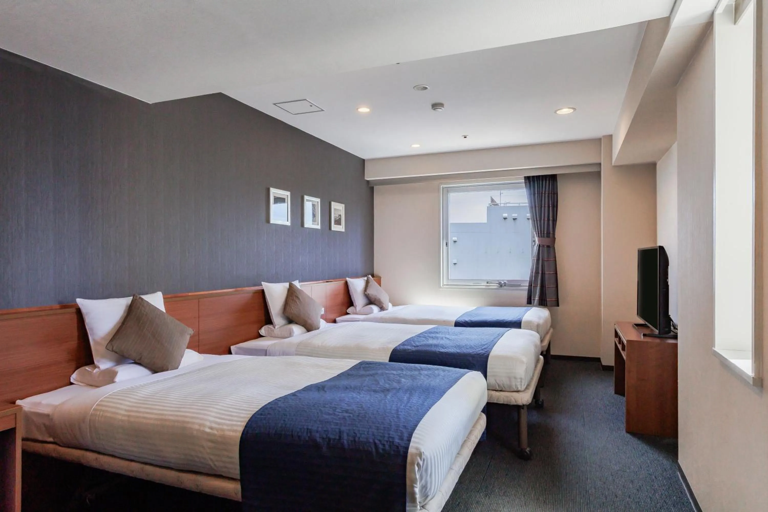 Photo of the whole room, Bed in HOTEL MYSTAYS Nagoya Sakae