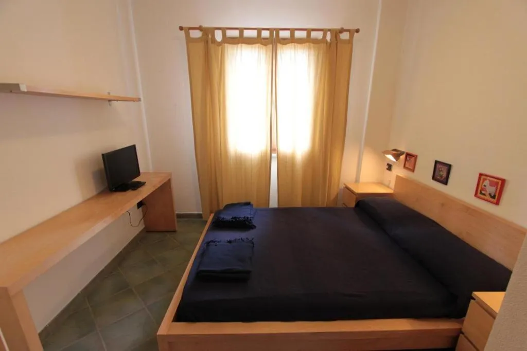 Bed in Hotel Residence Hibiscus