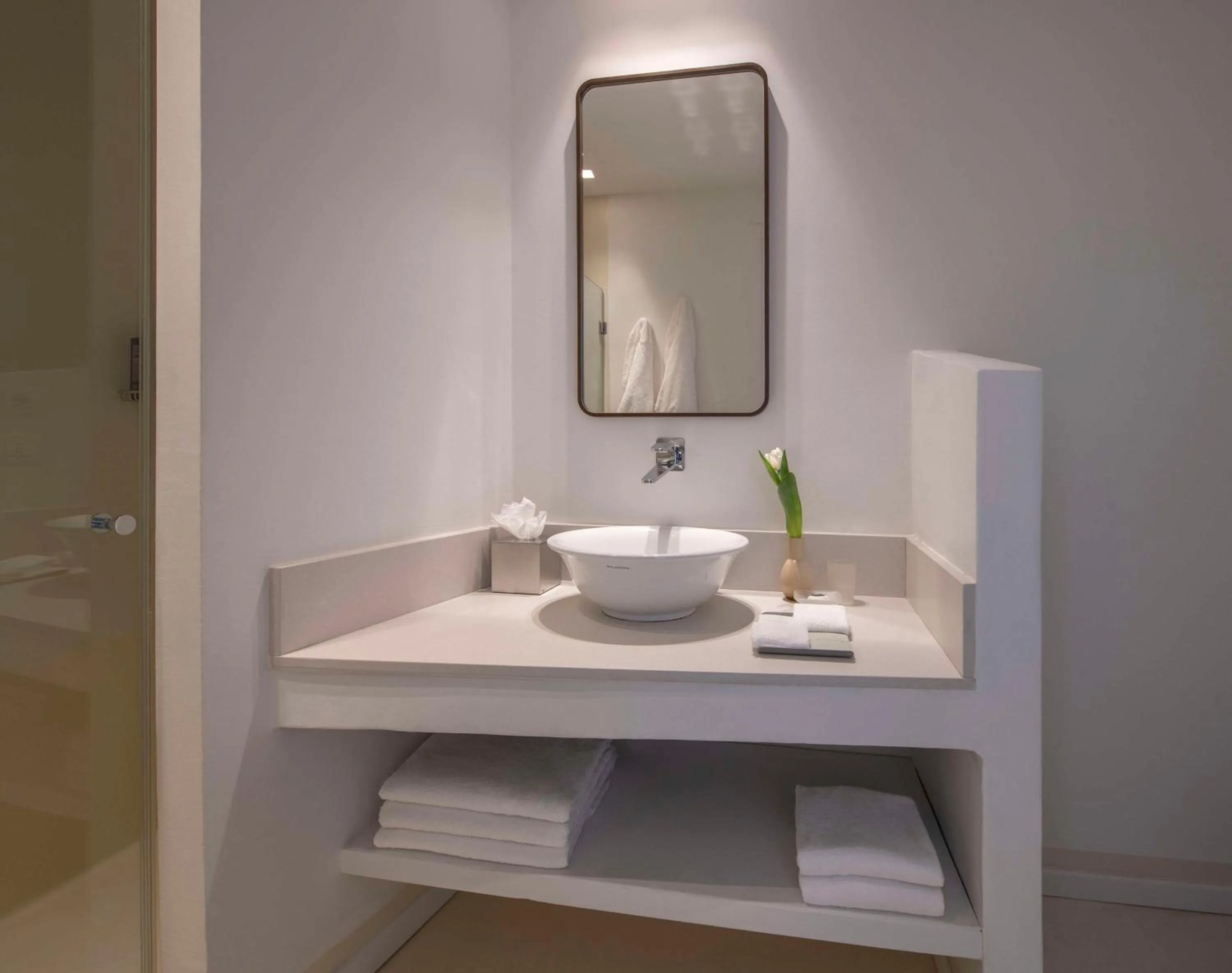 Bathroom in Baia Di Chia Resort Sardinia, Curio Collection By Hilton