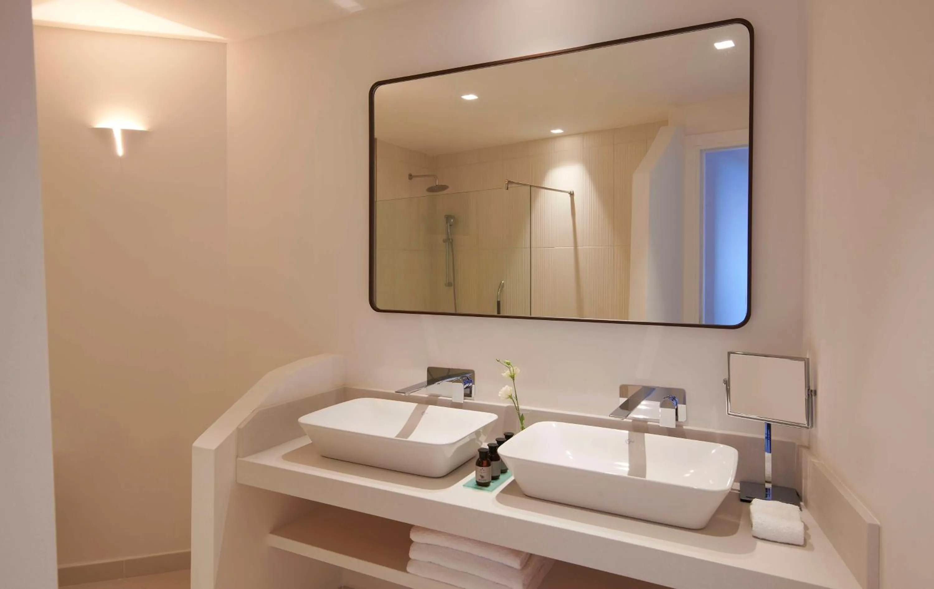 Bathroom in Baia Di Chia Resort Sardinia, Curio Collection By Hilton