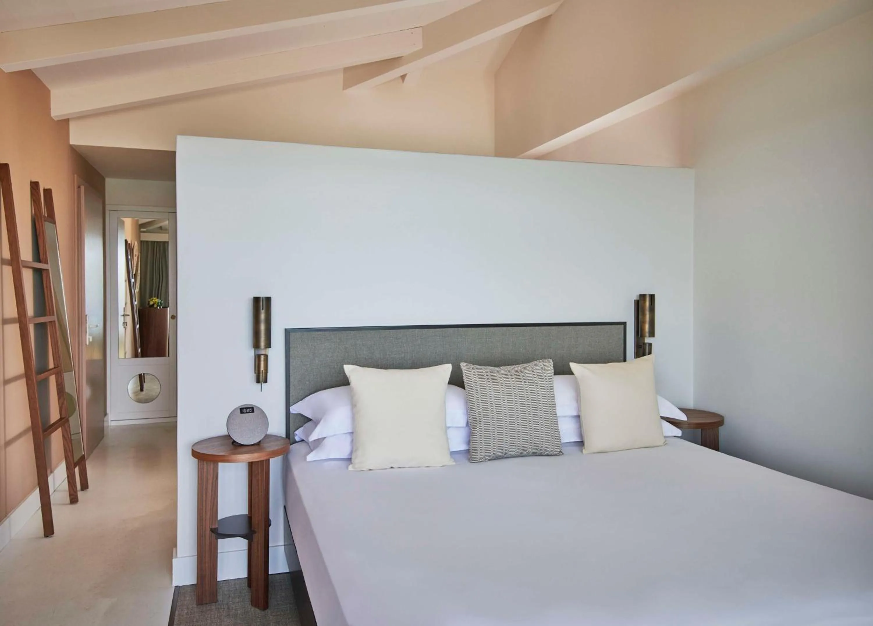 Bed in Baia Di Chia Resort Sardinia, Curio Collection By Hilton
