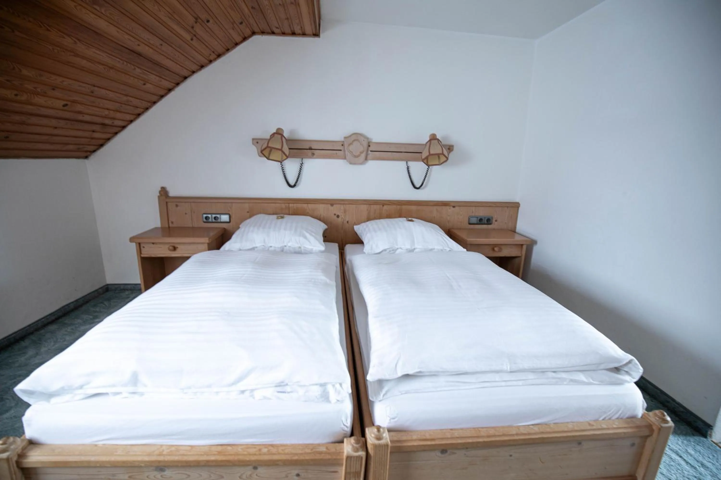 Photo of the whole room, Bed in Landhotel Jägerhof