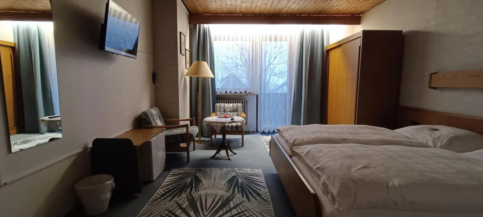 Photo of the whole room, Bed in Landhotel Jägerhof