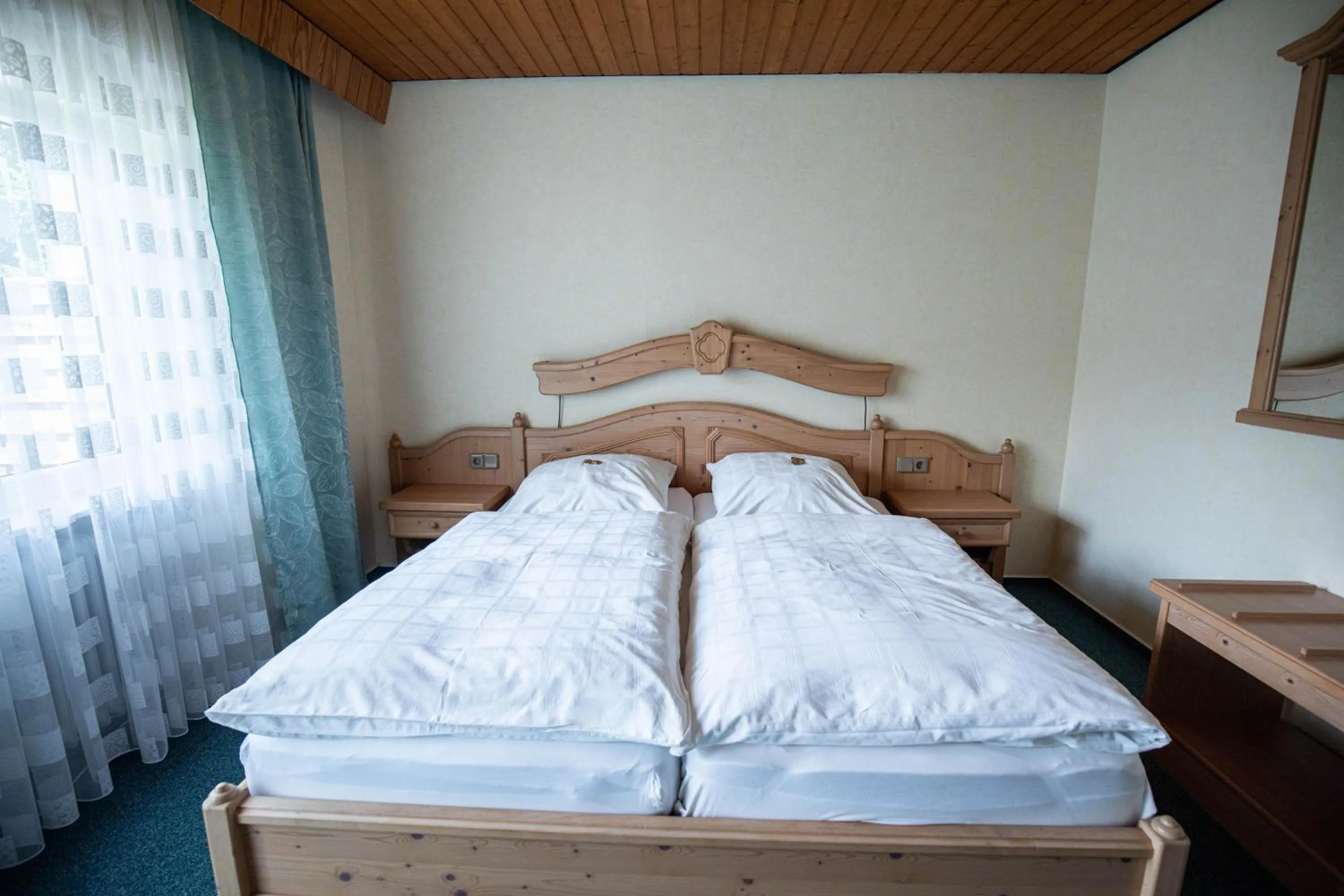 Photo of the whole room, Bed in Landhotel Jägerhof