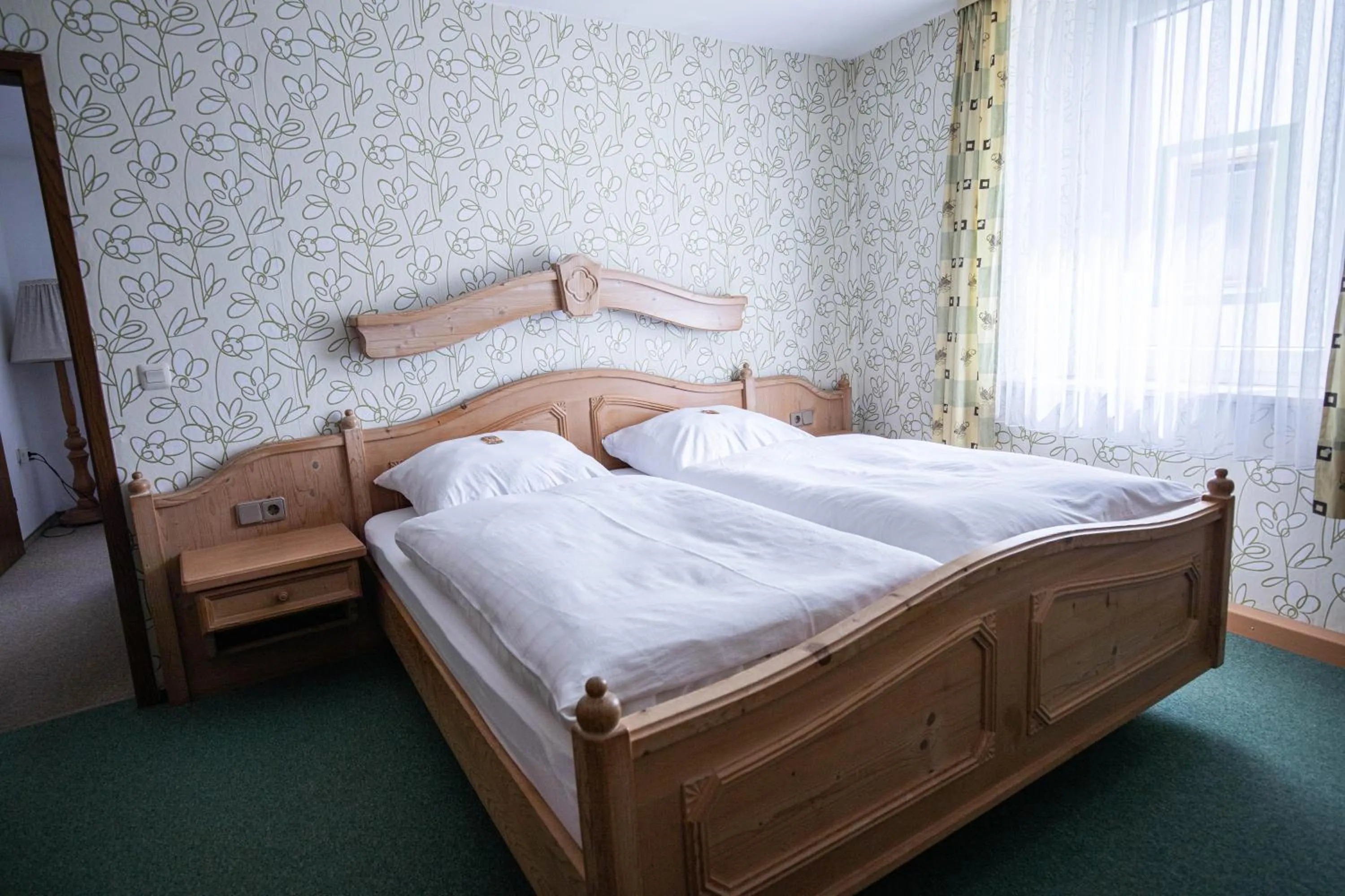 Photo of the whole room, Bed in Landhotel Jägerhof