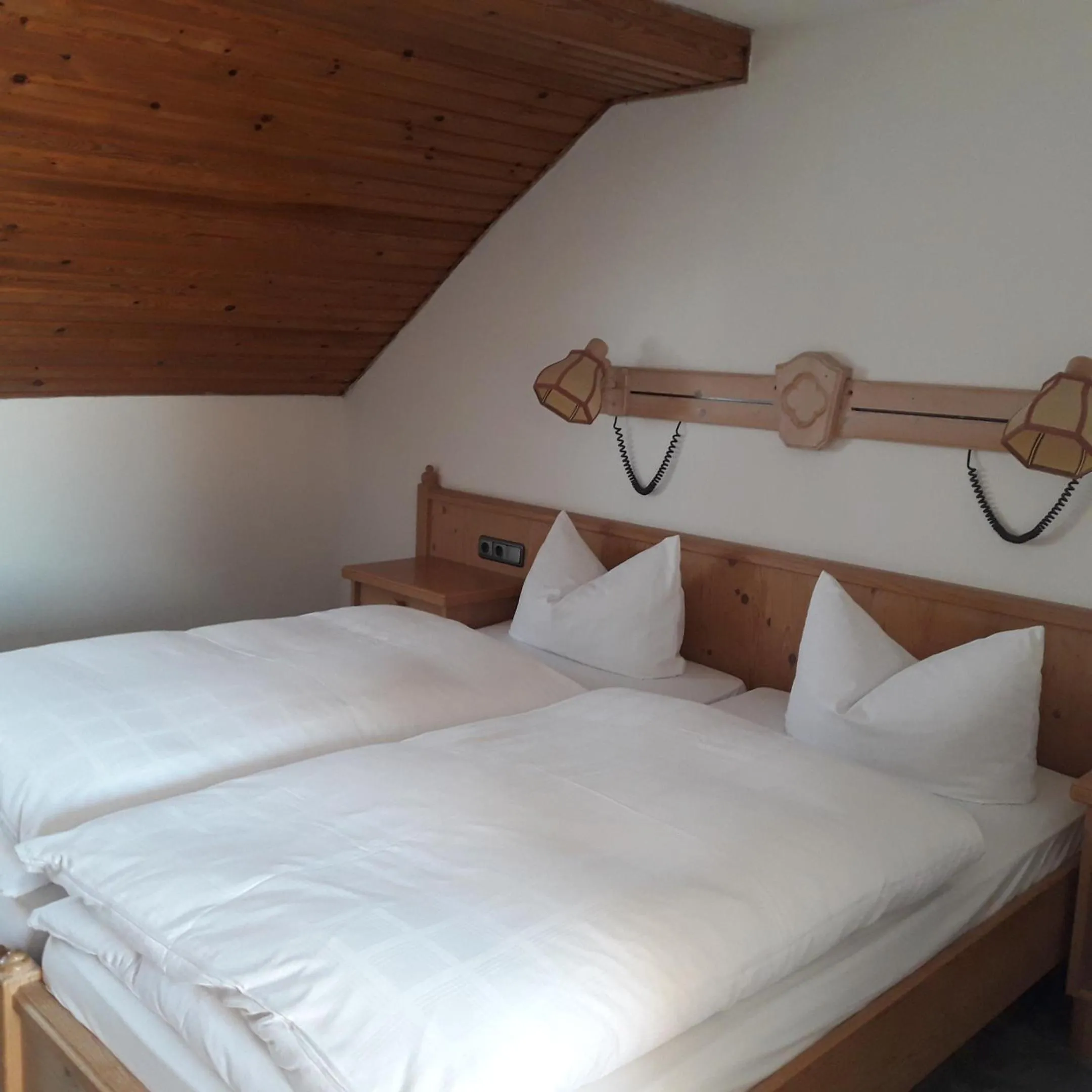 Photo of the whole room, Bed in Landhotel Jägerhof