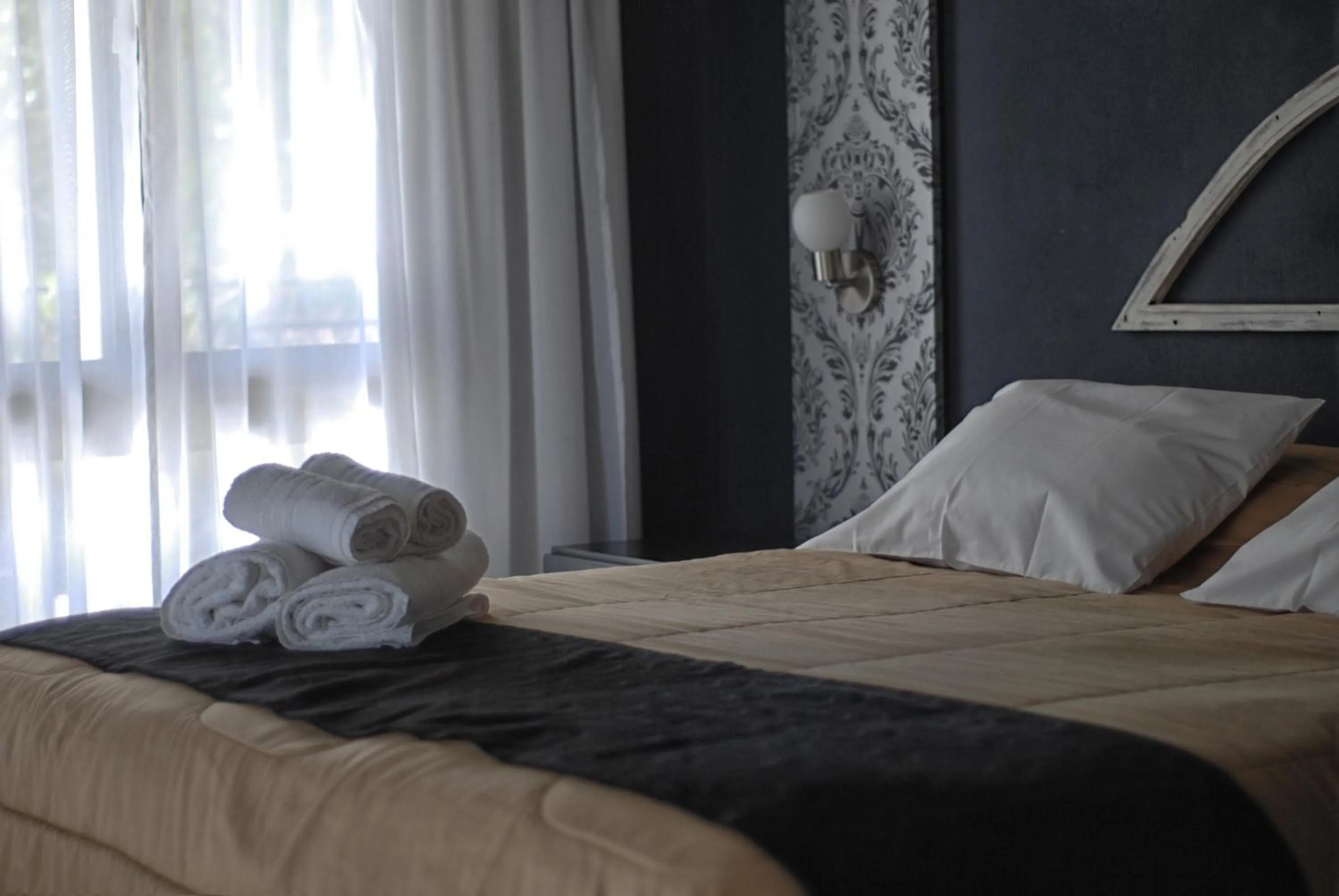 Bed in Atelier Hotel de Charme