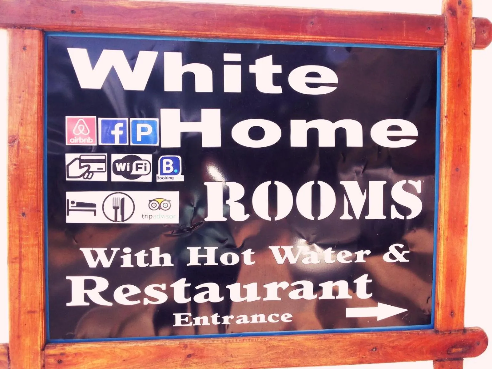 Property logo or sign in White Home