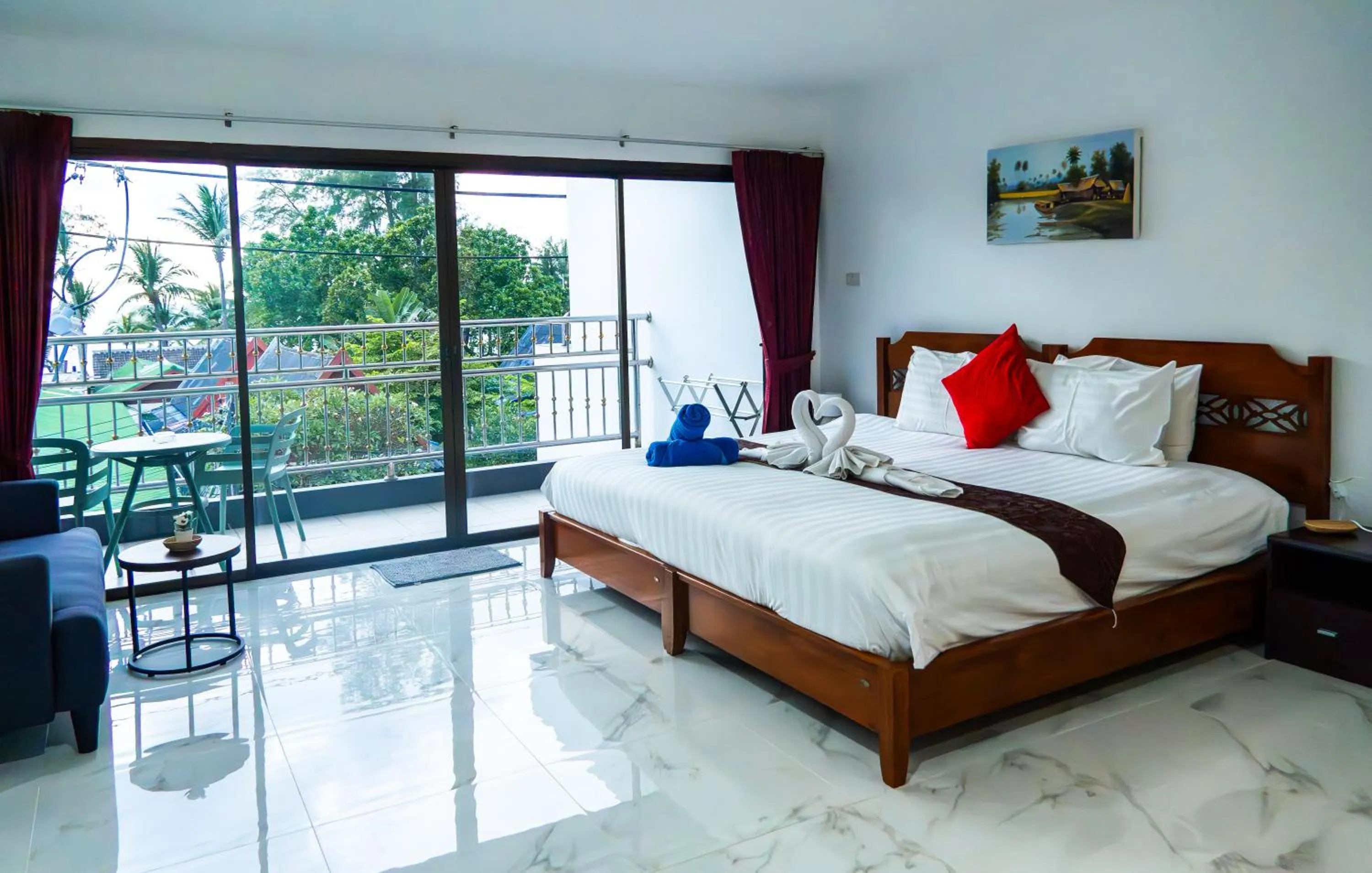 Bed in Deng's kamala beach Guesthouse