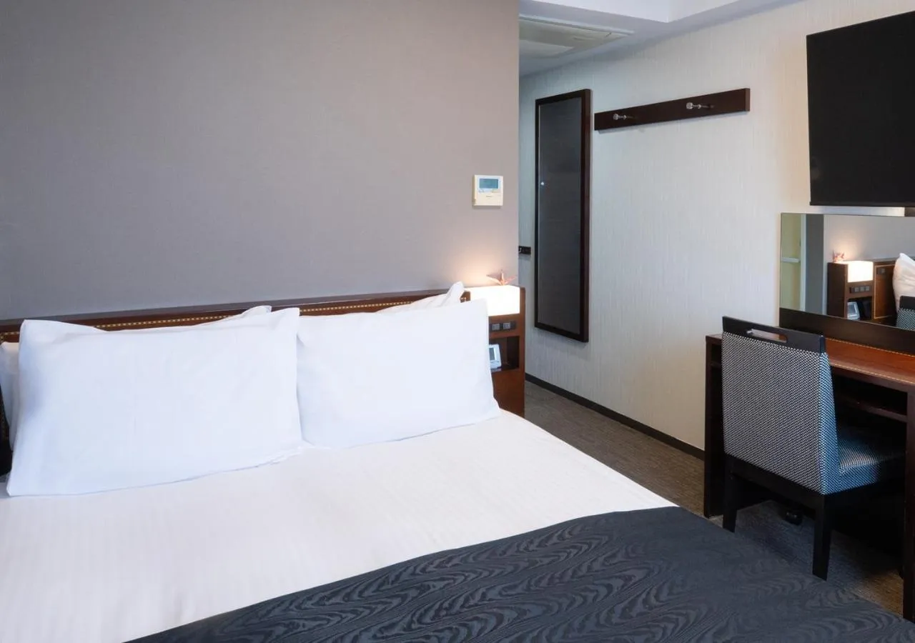Bed in APA Hotel Haneda Anamori Inari Ekimae