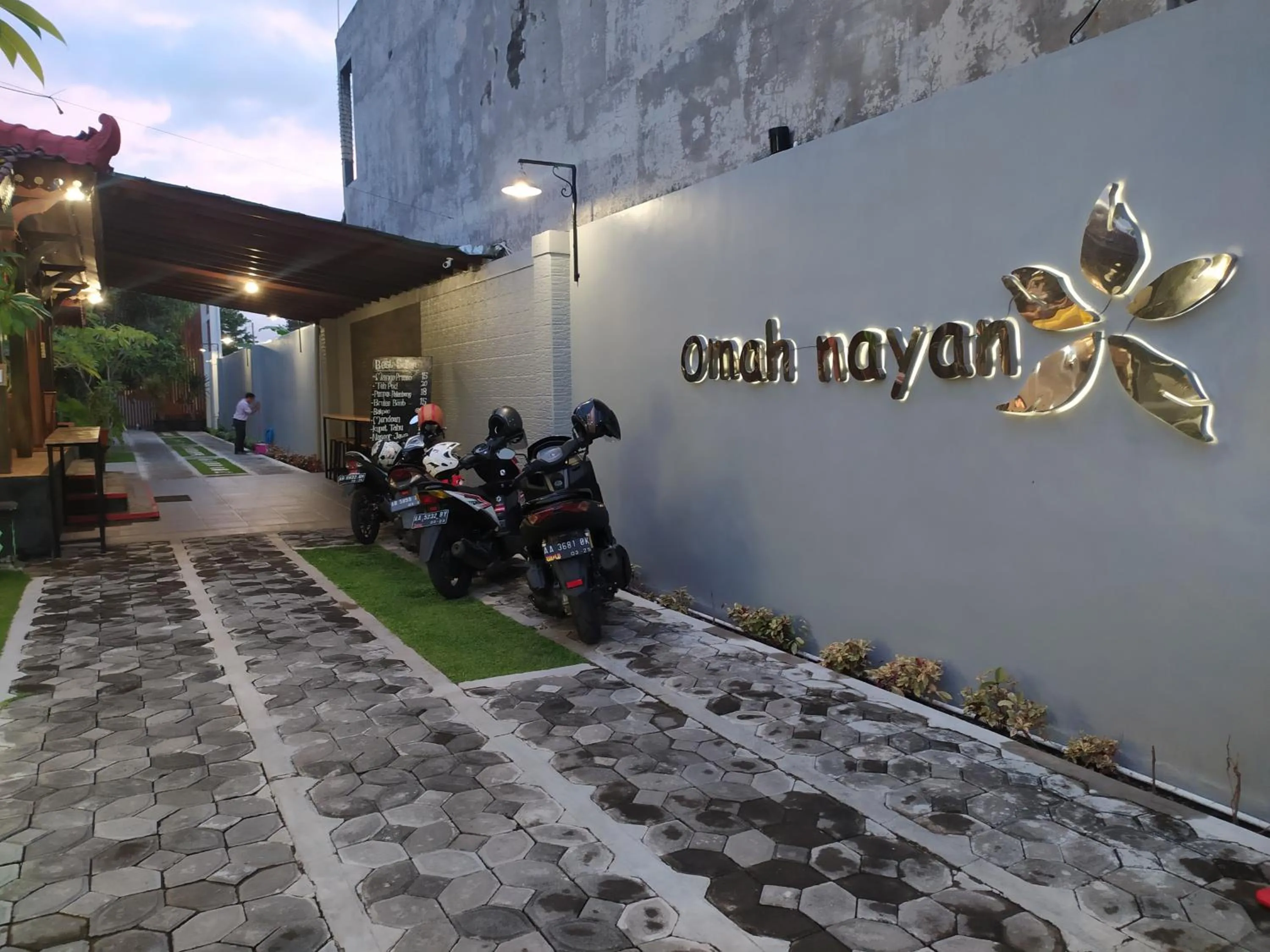 Property logo or sign in Omah Nayan Guesthouse